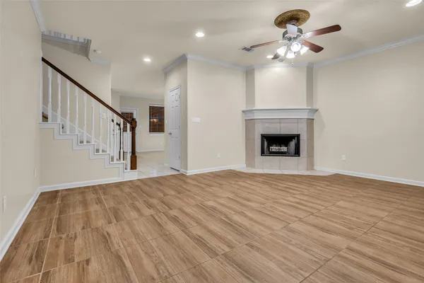 a kitchen with white cabinets a sink and appliances