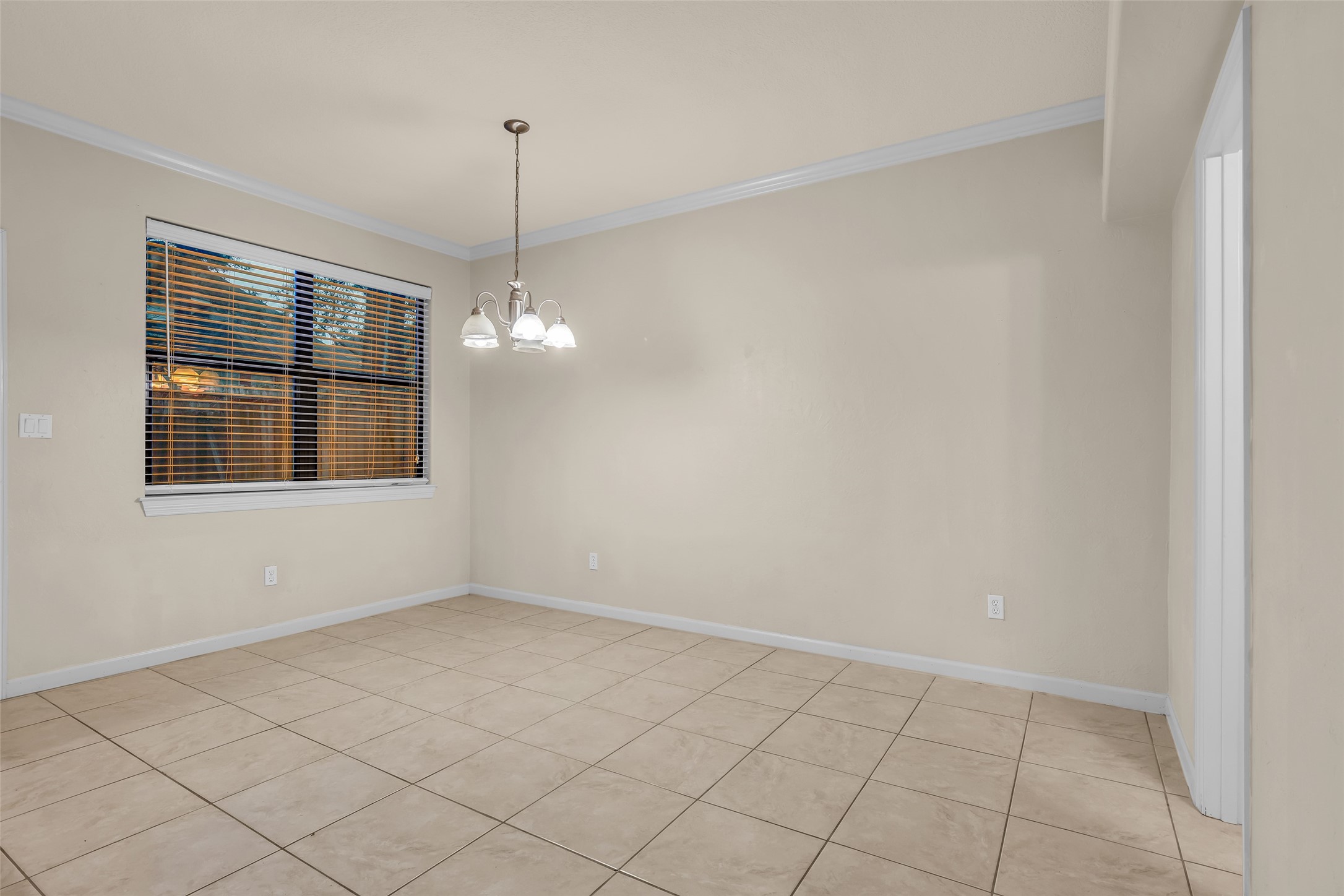 1898 Longmire Road, Unit 5 Conroe, TX 77304 - Photo 26 of 48 a view of an empty room with windows