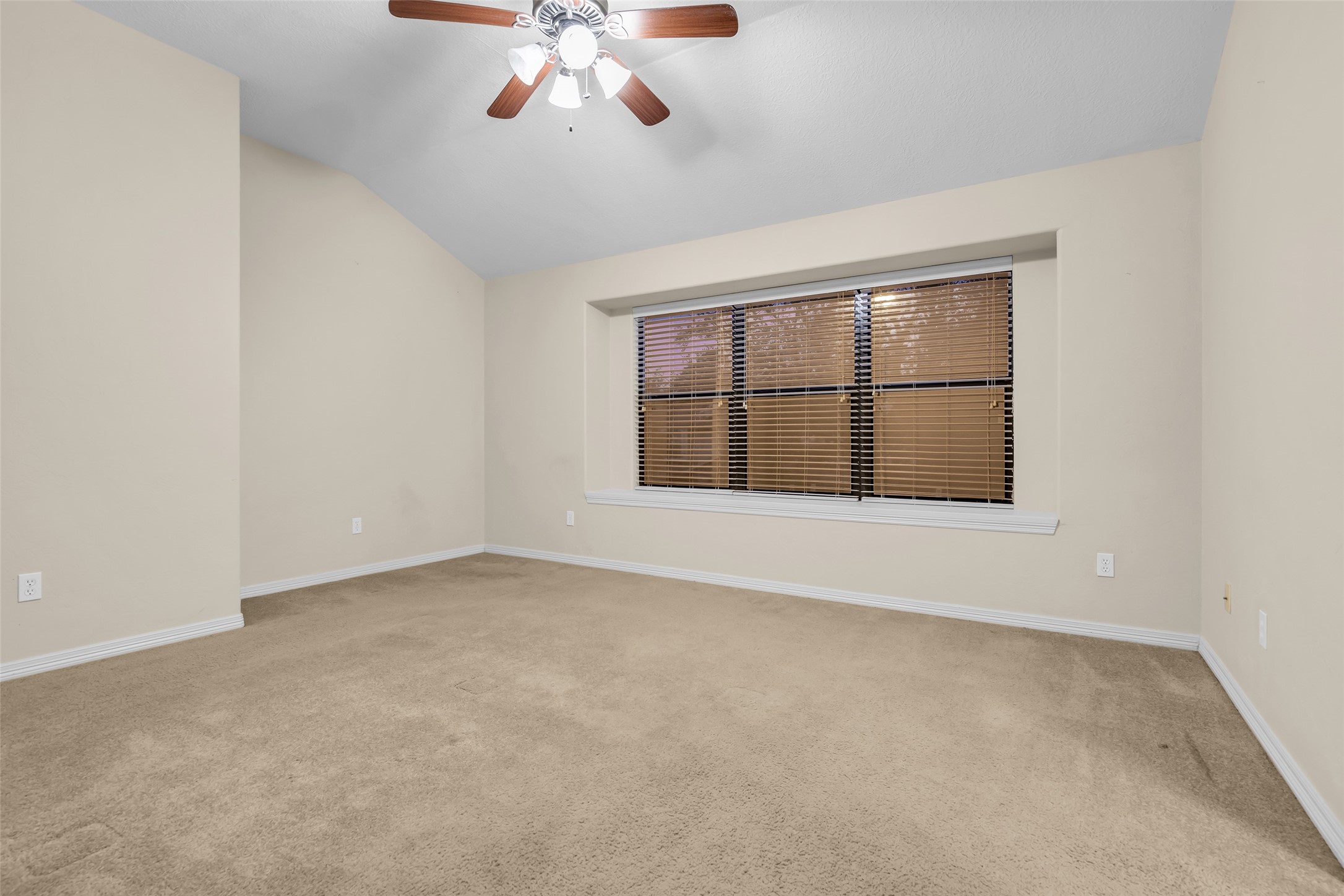 1898 Longmire Road, Unit 5 Conroe, TX 77304 - Photo 32 of 48 a view of an empty room with a window