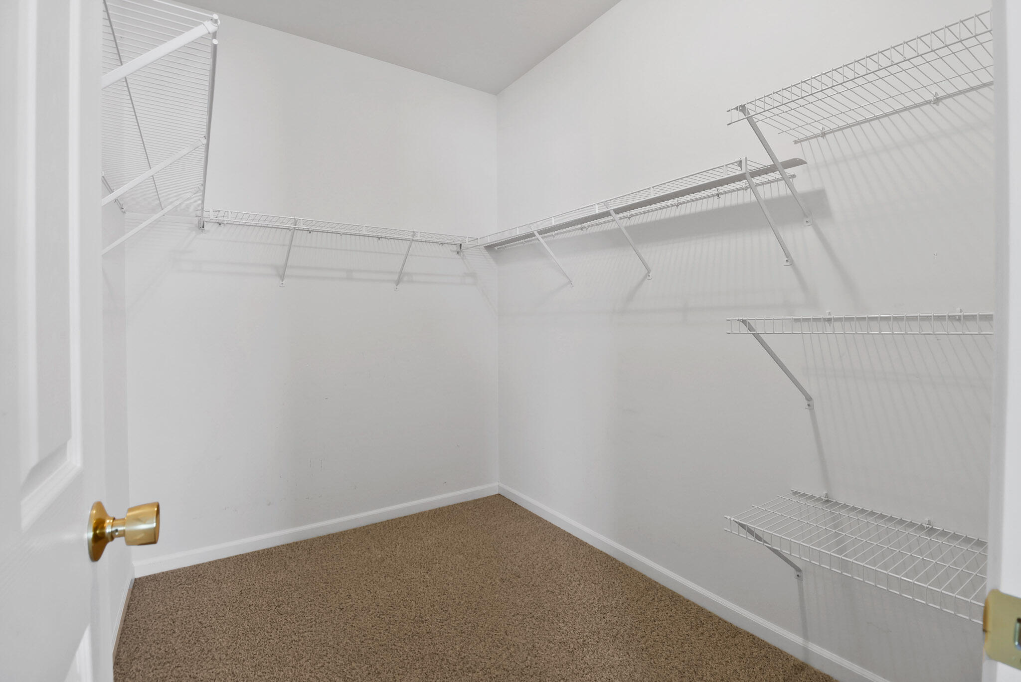 11732 Virginia Court Crown Point, IN 46307 - Photo 17 of 26 a view of small space with racks on the wall