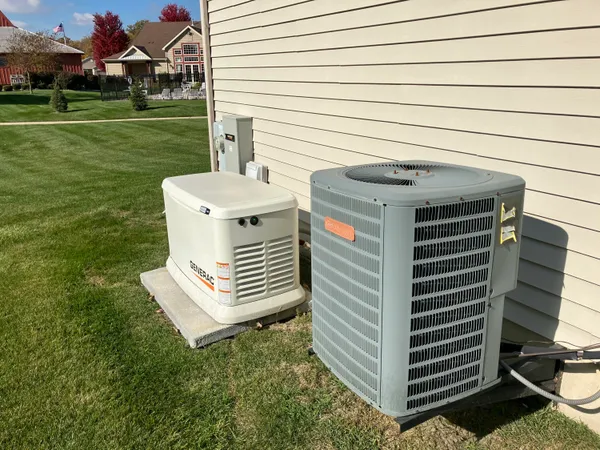 a view of a backyard with sitting area