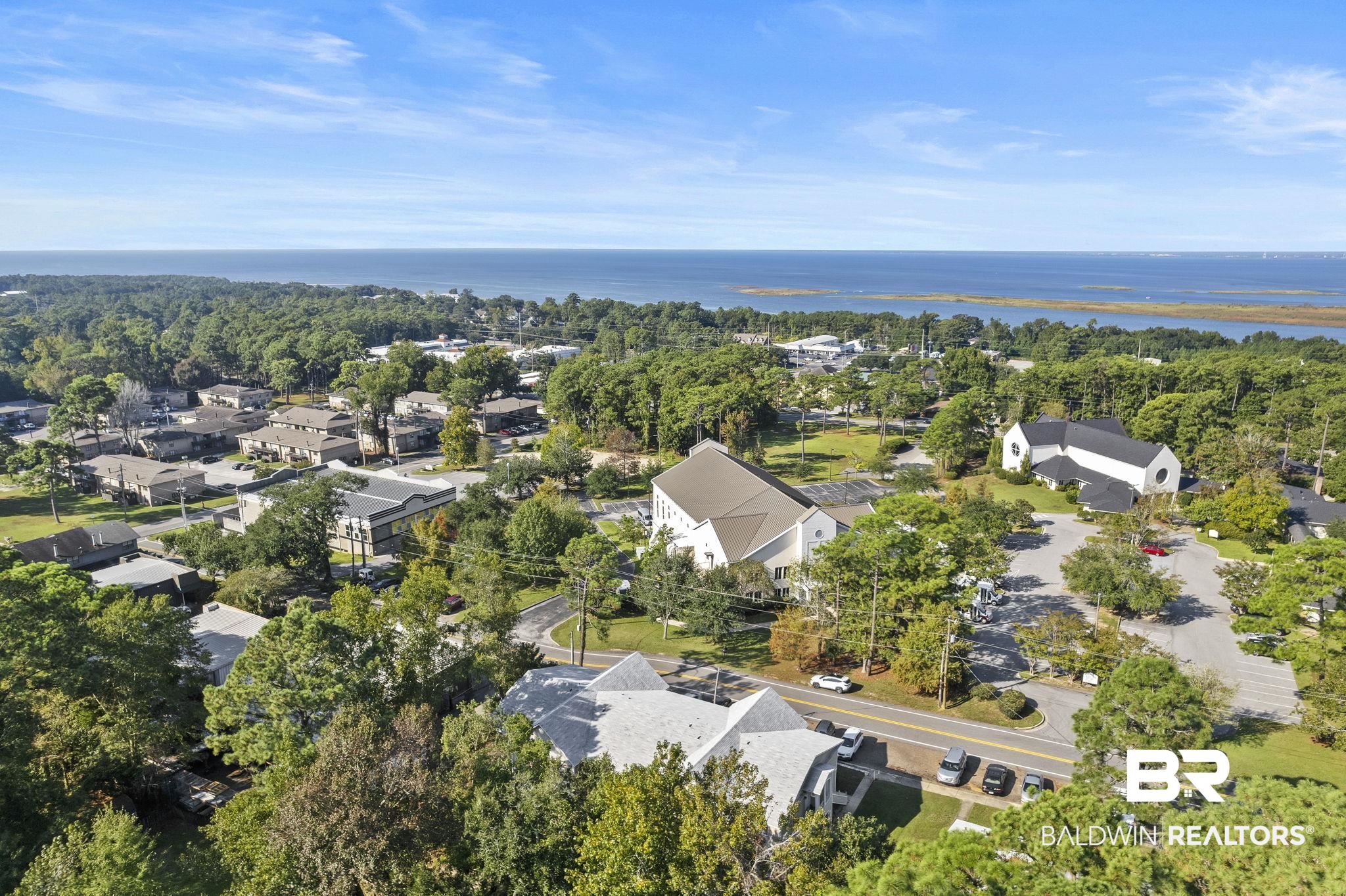 110 5th Street, Unit C103 Daphne, AL 36526 - Photo 43 of 46 Drone / aerial view featuring a water view