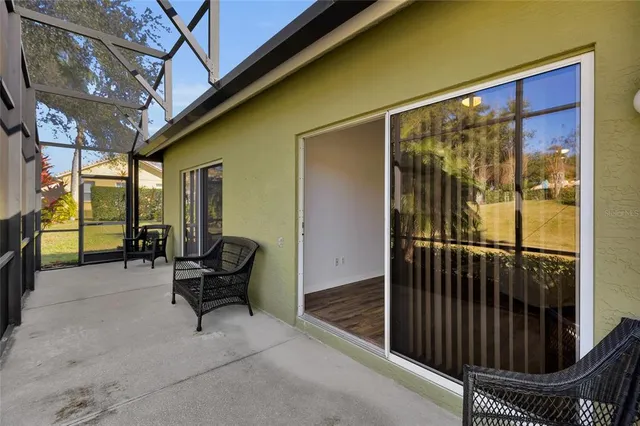 a view of a porch with furniture