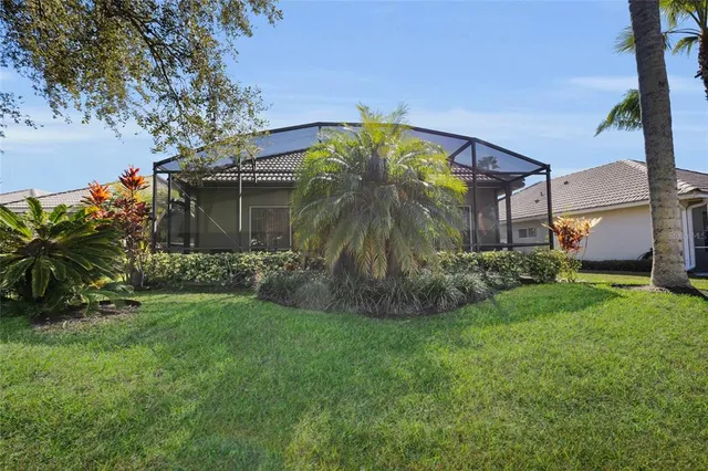 a front view of house with garden