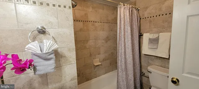 a room with cabinets and wooden floor