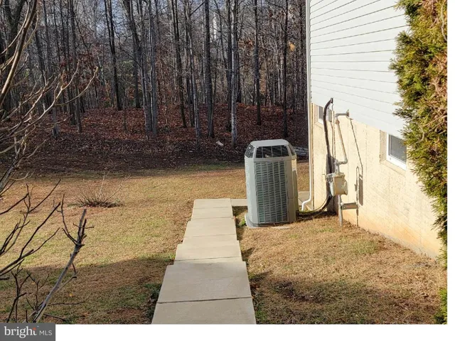 a picture of a room with wooden floor