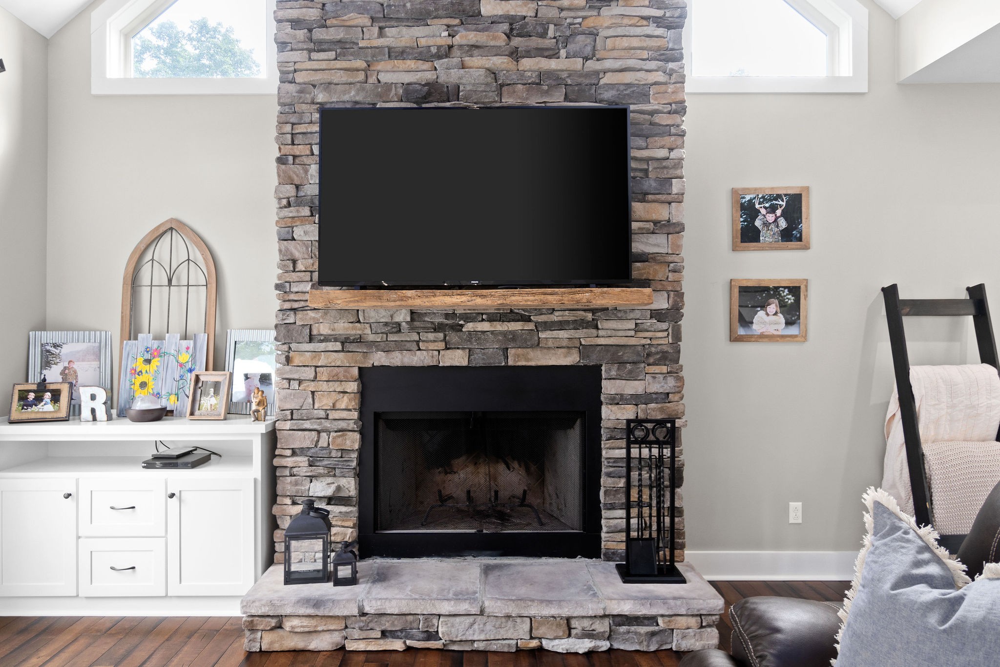 1855 Tottys Bend Road Duck River, TN 38454 - Photo 12 of 46 a living room with furniture a flat screen tv and a fireplace
