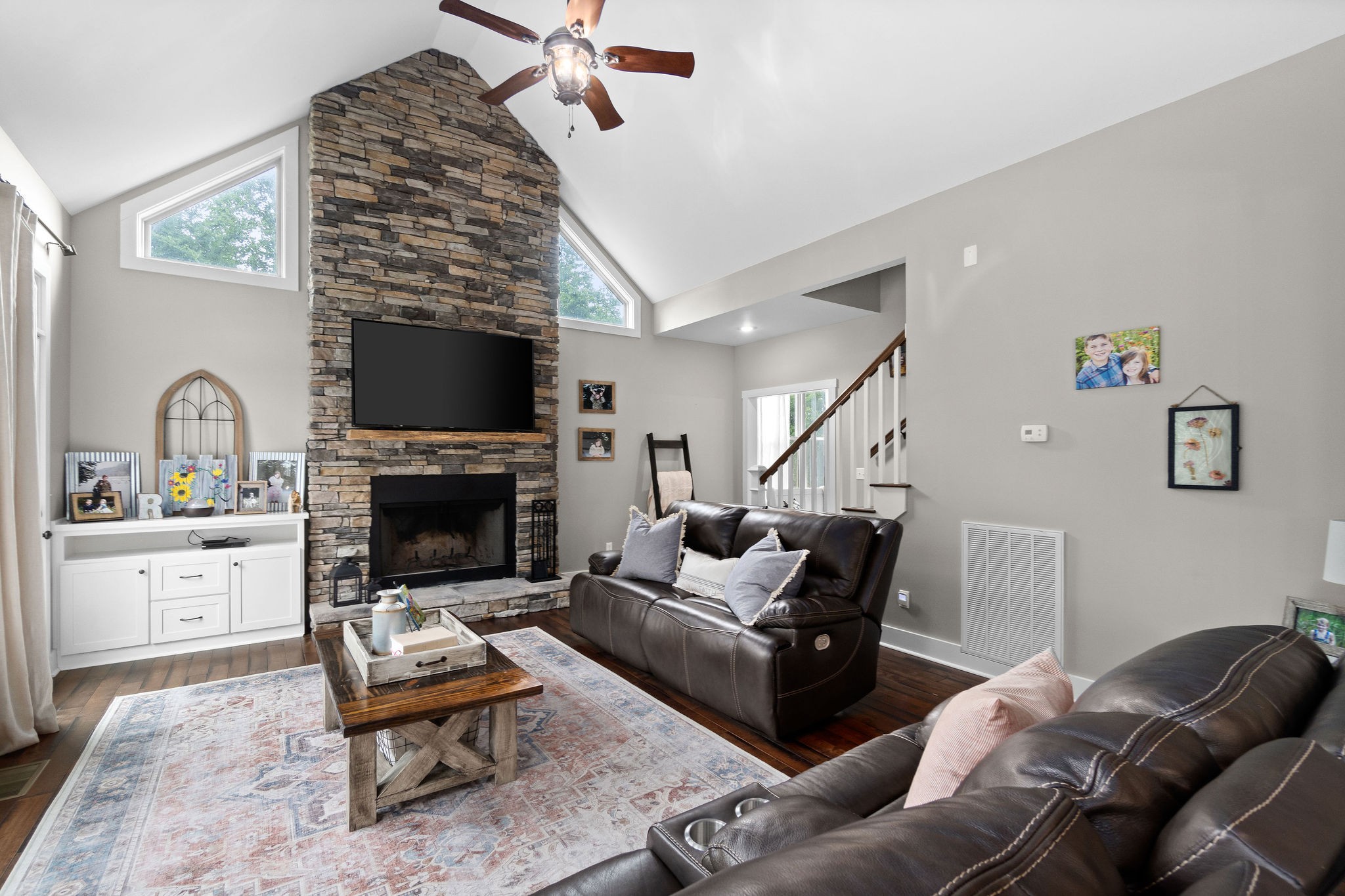 1855 Tottys Bend Road Duck River, TN 38454 - Photo 13 of 46 a living room with furniture a fireplace and a rug