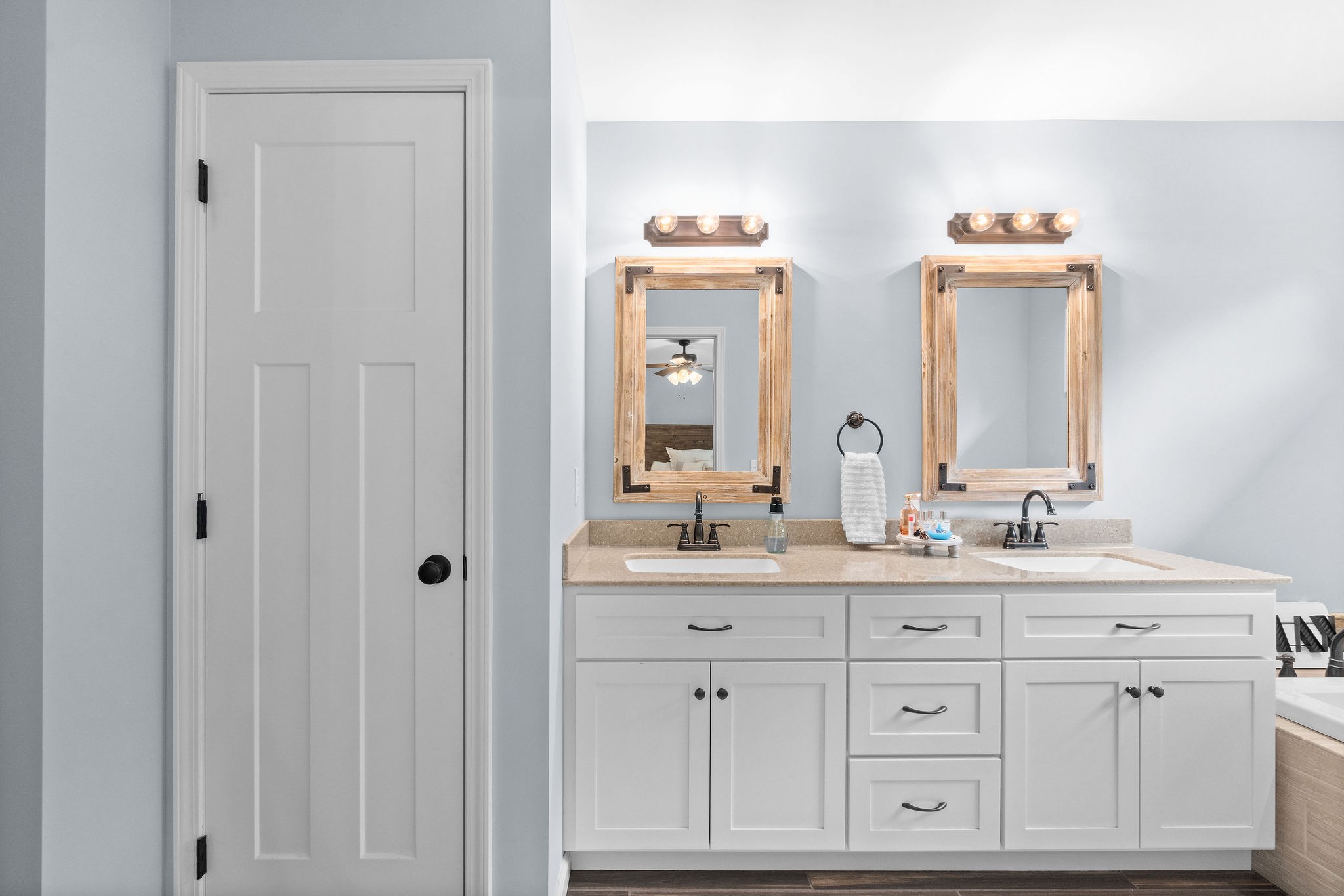 1855 Tottys Bend Road Duck River, TN 38454 - Photo 22 of 46 a bathroom with double sink and a mirror