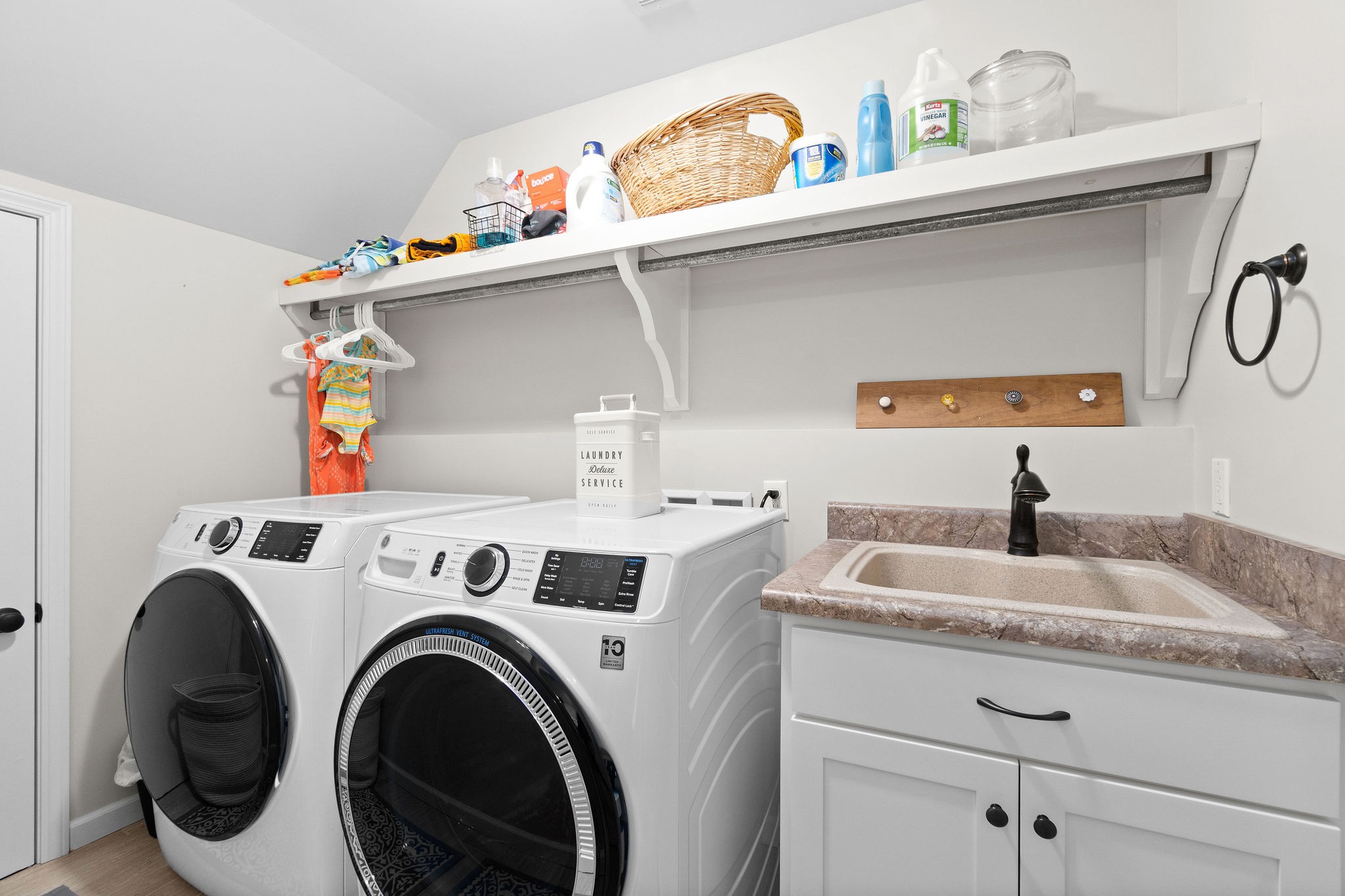1855 Tottys Bend Road Duck River, TN 38454 - Photo 27 of 46 a utility room with dryer and washer