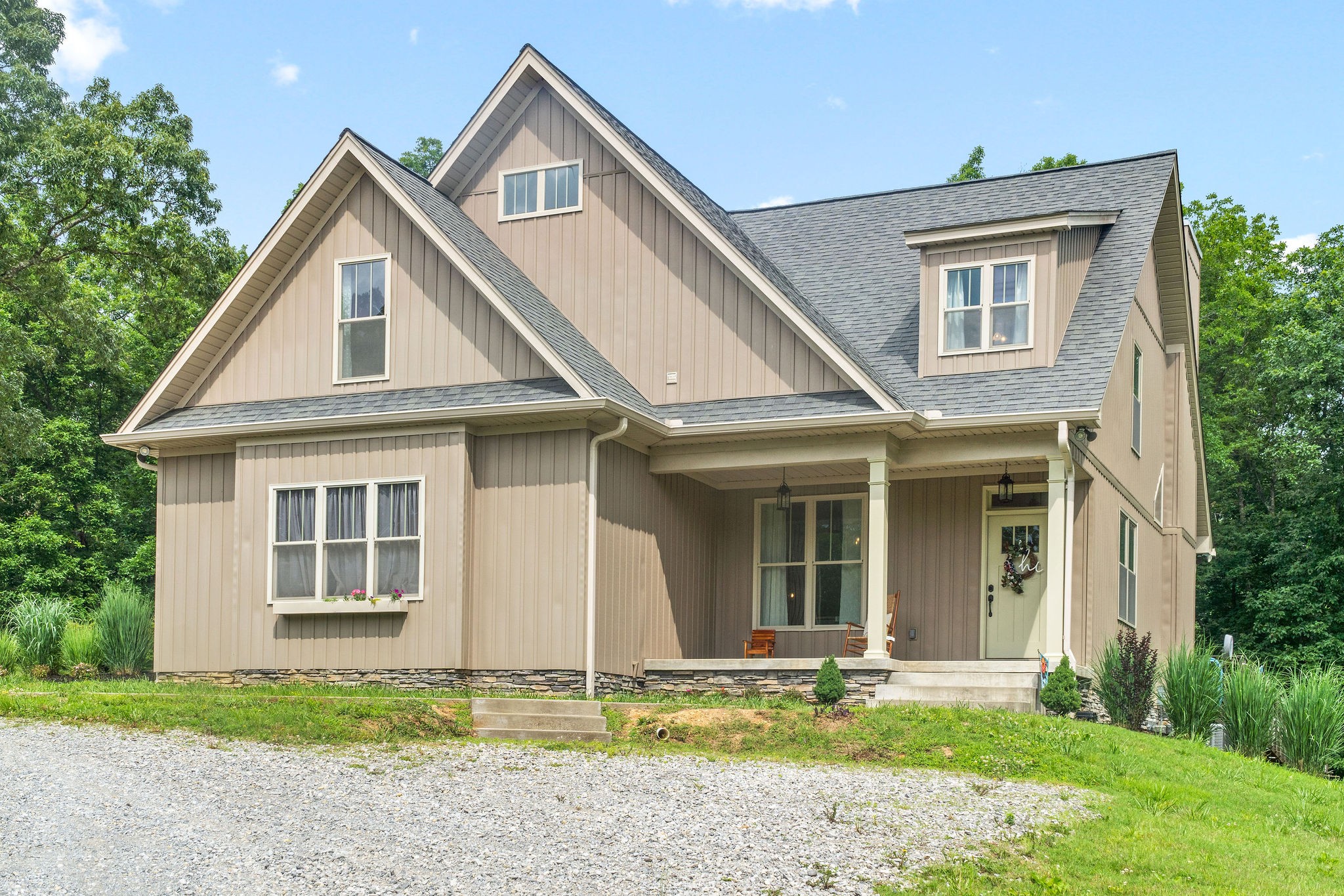 1855 Tottys Bend Road Duck River, TN 38454 - Photo 3 of 46 a front view of a house with garden