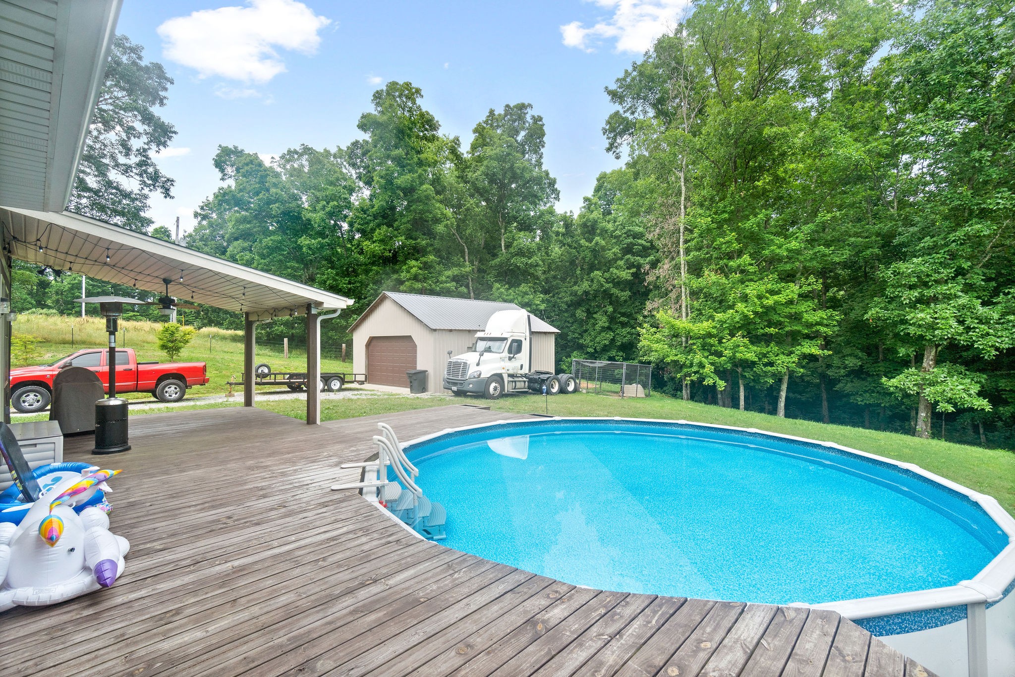 1855 Tottys Bend Road Duck River, TN 38454 - Photo 31 of 46 a view of pool with lawn chairs and plants