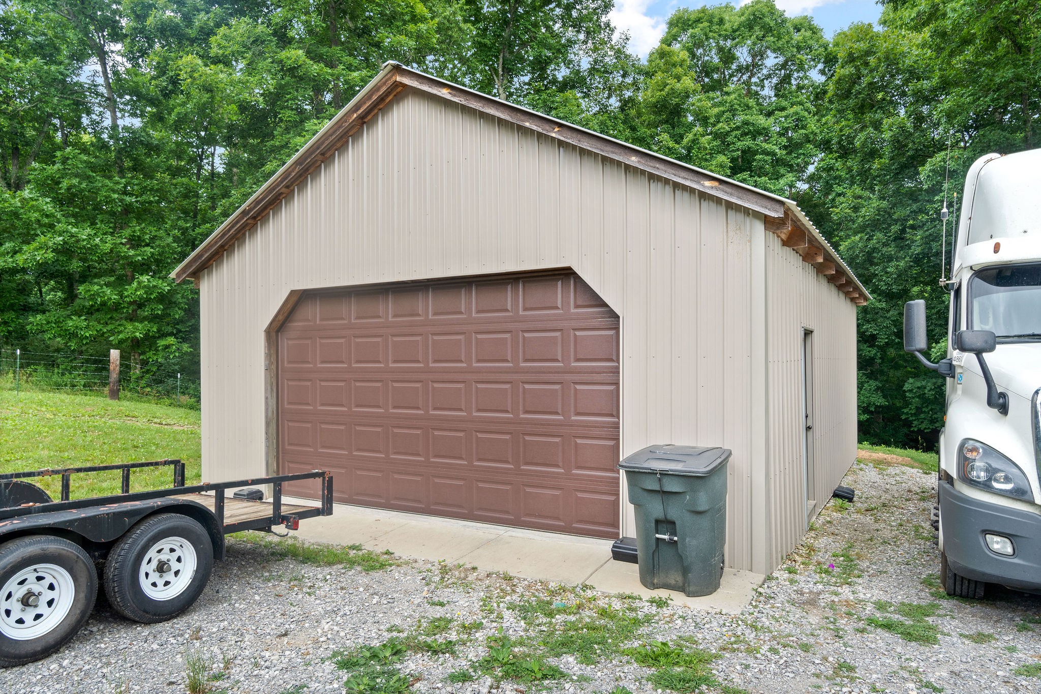 1855 Tottys Bend Road Duck River, TN 38454 - Photo 38 of 46 a view of a house with a backyard