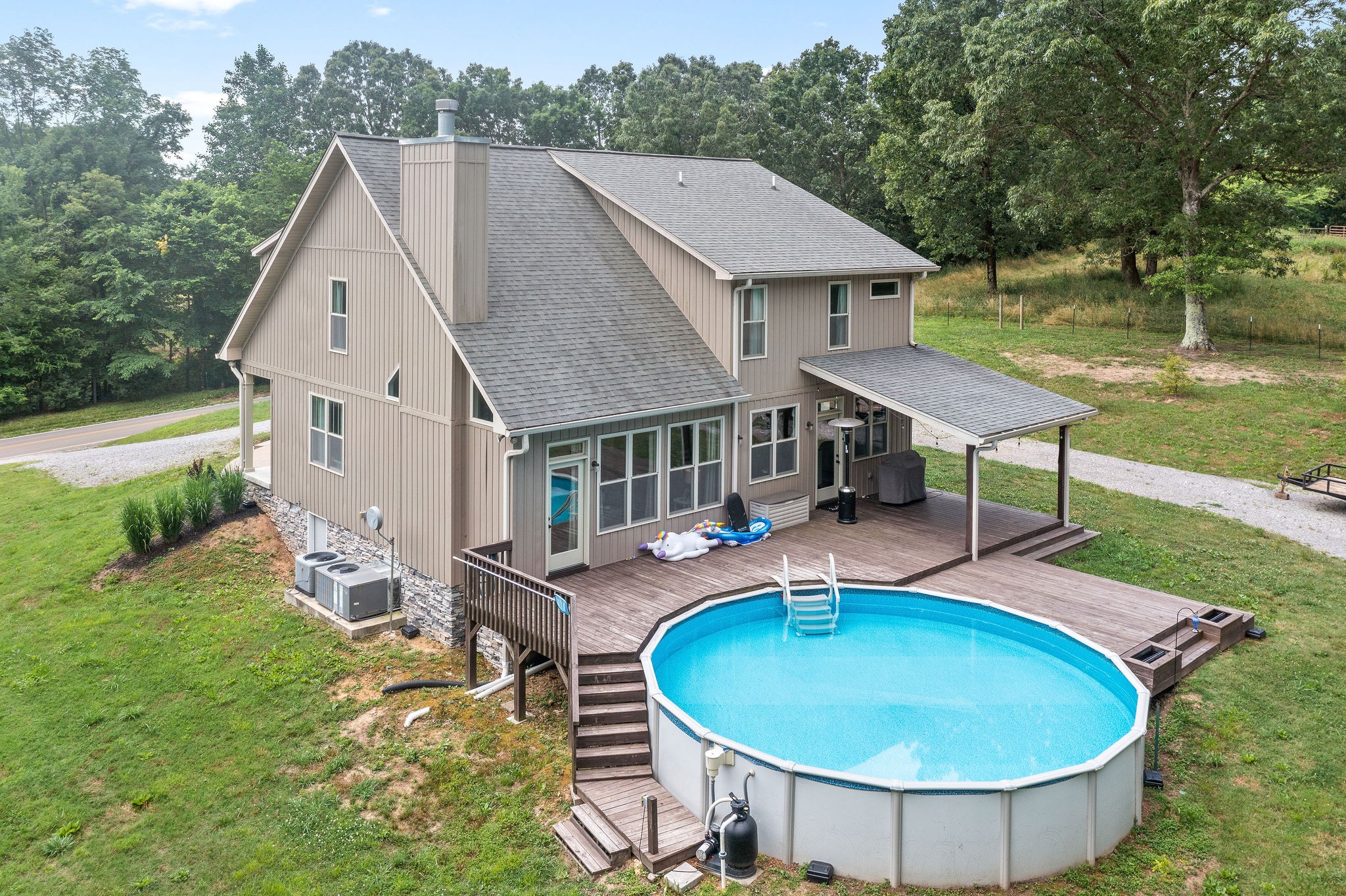 1855 Tottys Bend Road Duck River, TN 38454 - Photo 41 of 46 a aerial view of a house with swimming pool and porch
