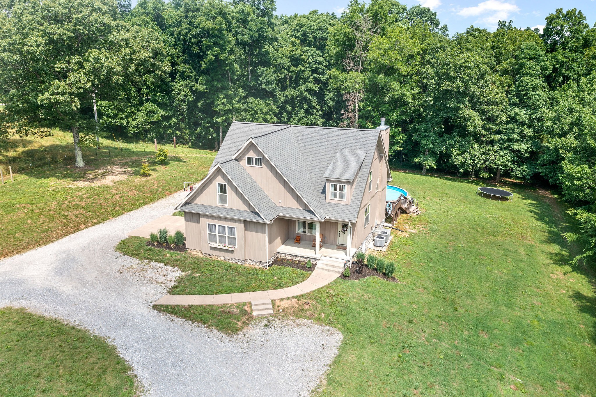 1855 Tottys Bend Road Duck River, TN 38454 - Photo 45 of 46 a aerial view of a house with swimming pool and big yard