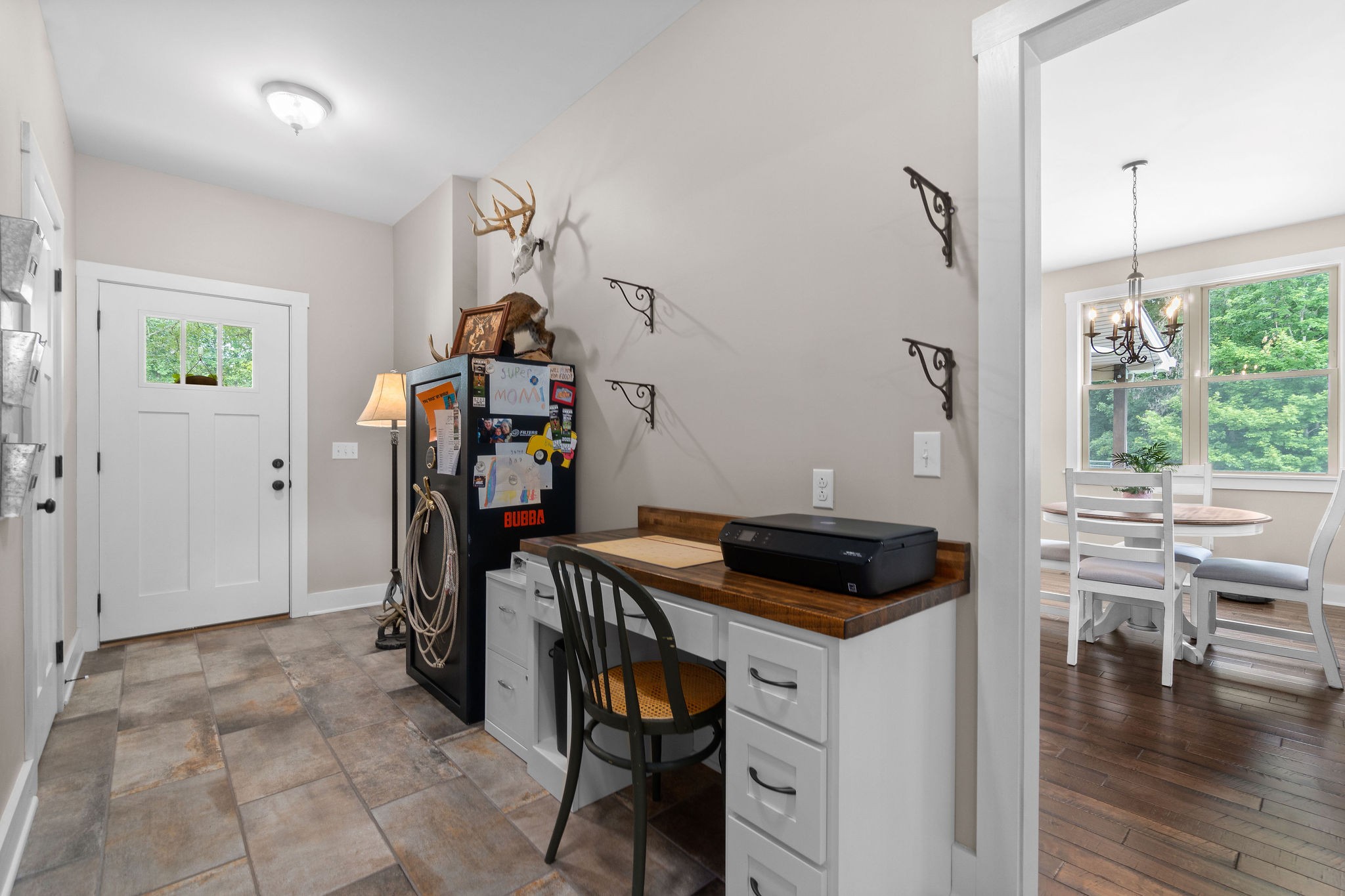 1855 Tottys Bend Road Duck River, TN 38454 - Photo 8 of 46 a view of a workspace with furniture and wooden floor