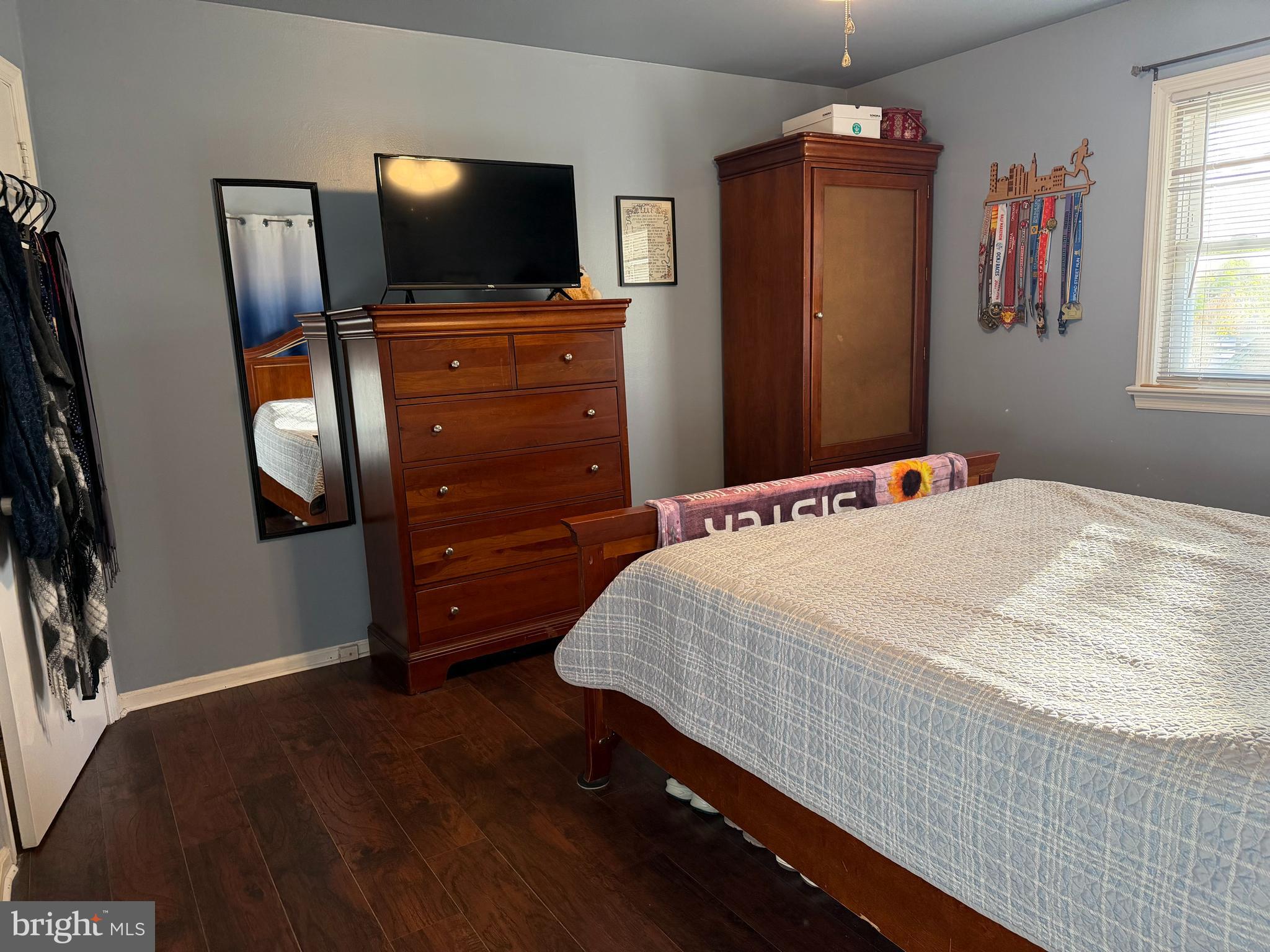 1 Nassau Road Somers Point, NJ 08244 - Photo 20 of 43 a bedroom with a bed and a flat screen tv
