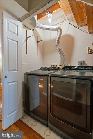 a stove top oven sitting inside of a kitchen