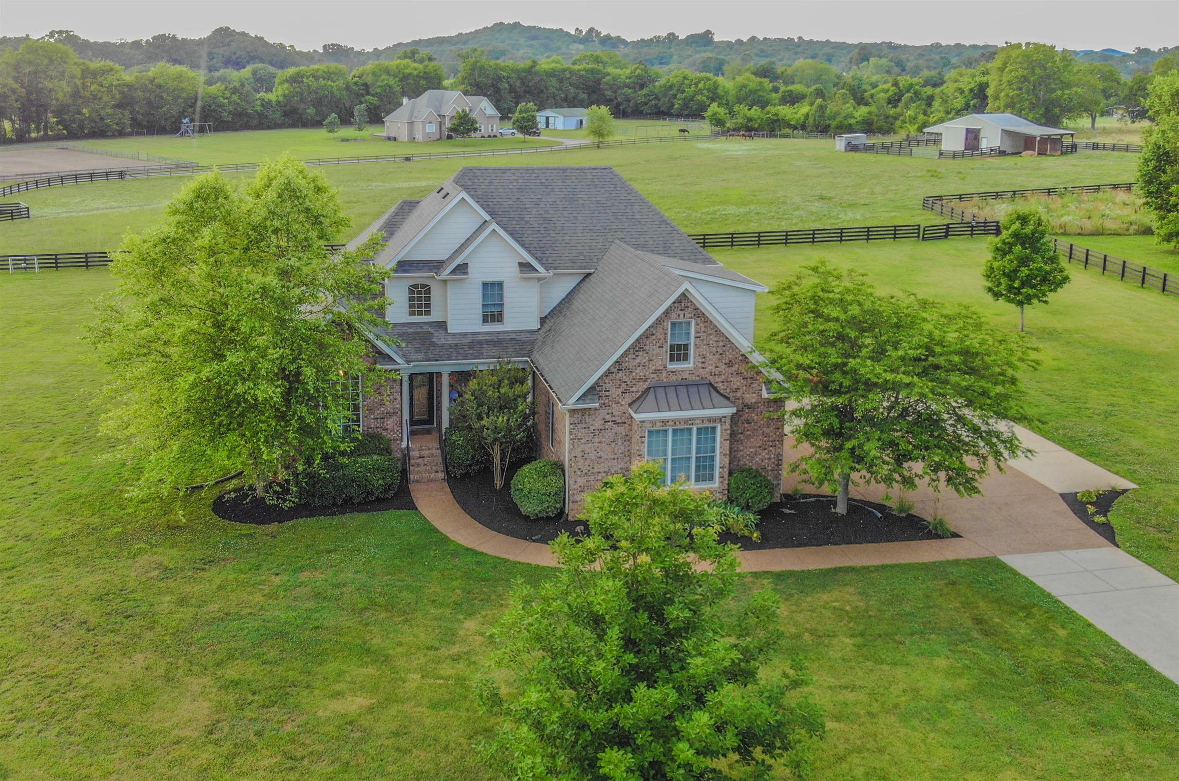 4097 Trinity Road Franklin, TN 37067 - Photo 1 of 30 a aerial view of a house with garden