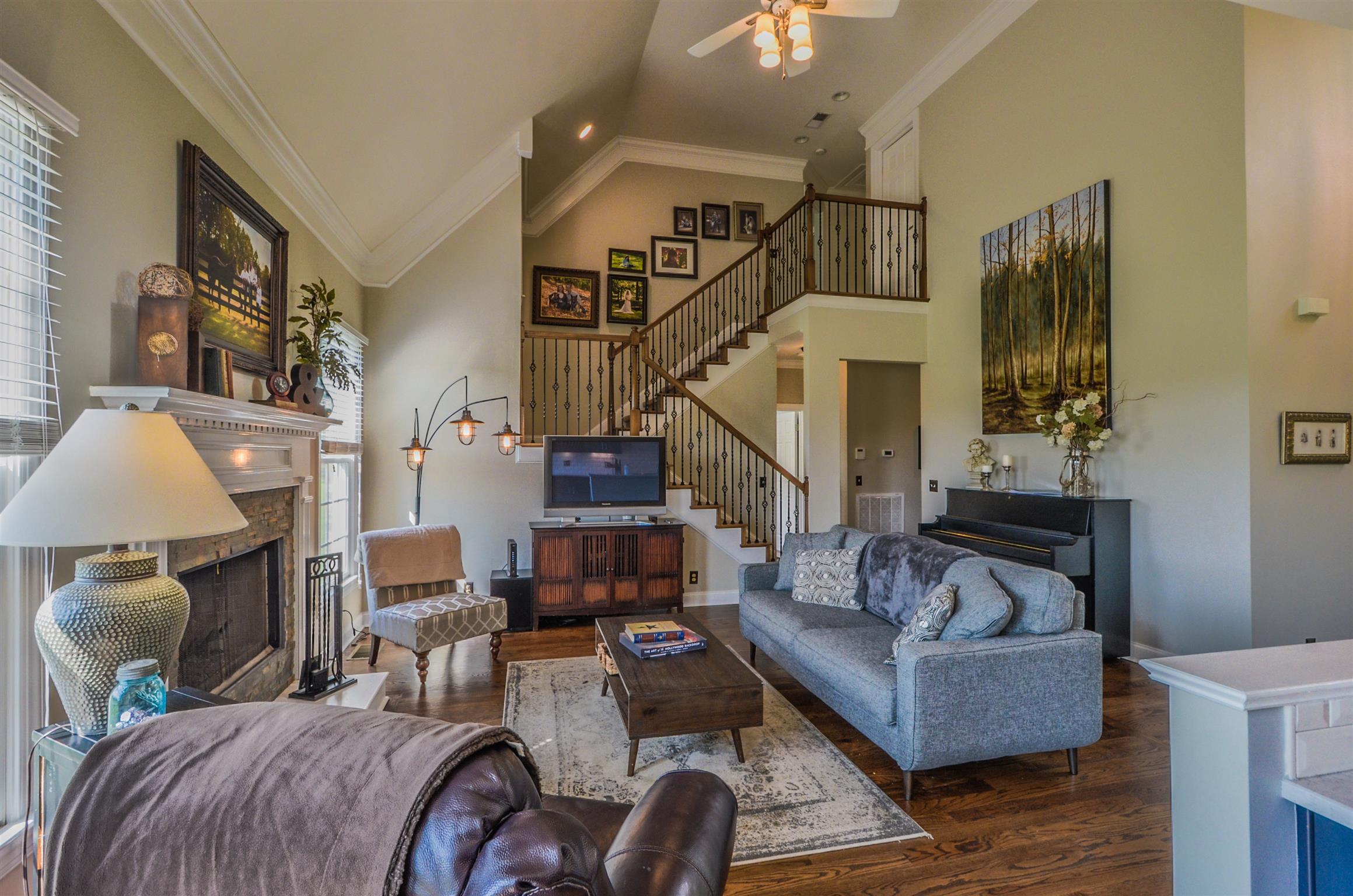 4097 Trinity Road Franklin, TN 37067 - Photo 12 of 30 a living room with furniture and a chandelier