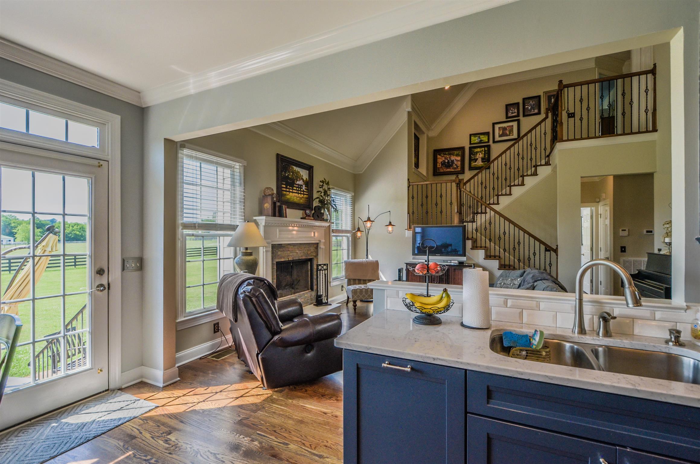4097 Trinity Road Franklin, TN 37067 - Photo 13 of 30 a living room with furniture and a fireplace