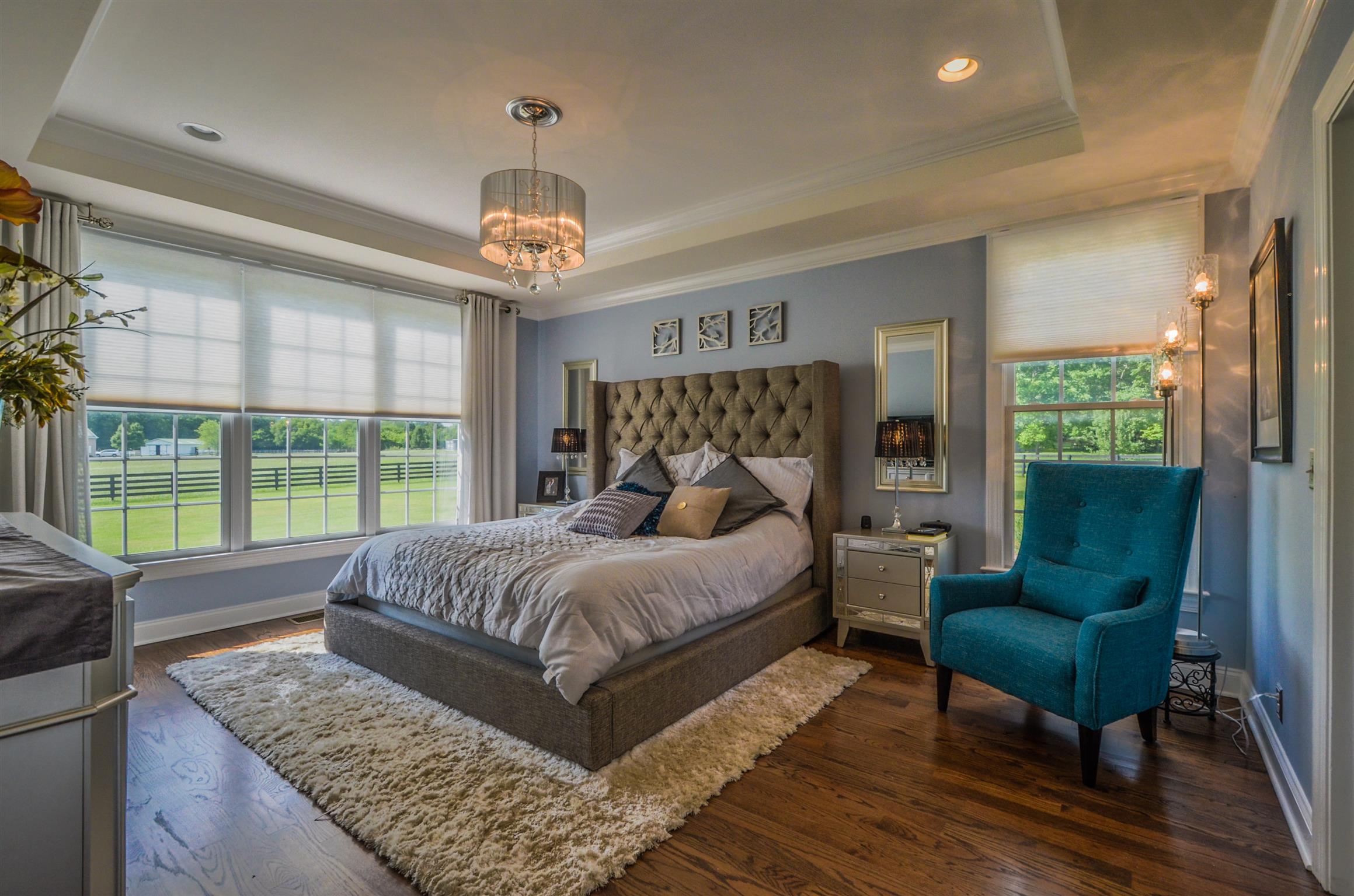 4097 Trinity Road Franklin, TN 37067 - Photo 20 of 30 a bedroom with a bed a couch and a large window