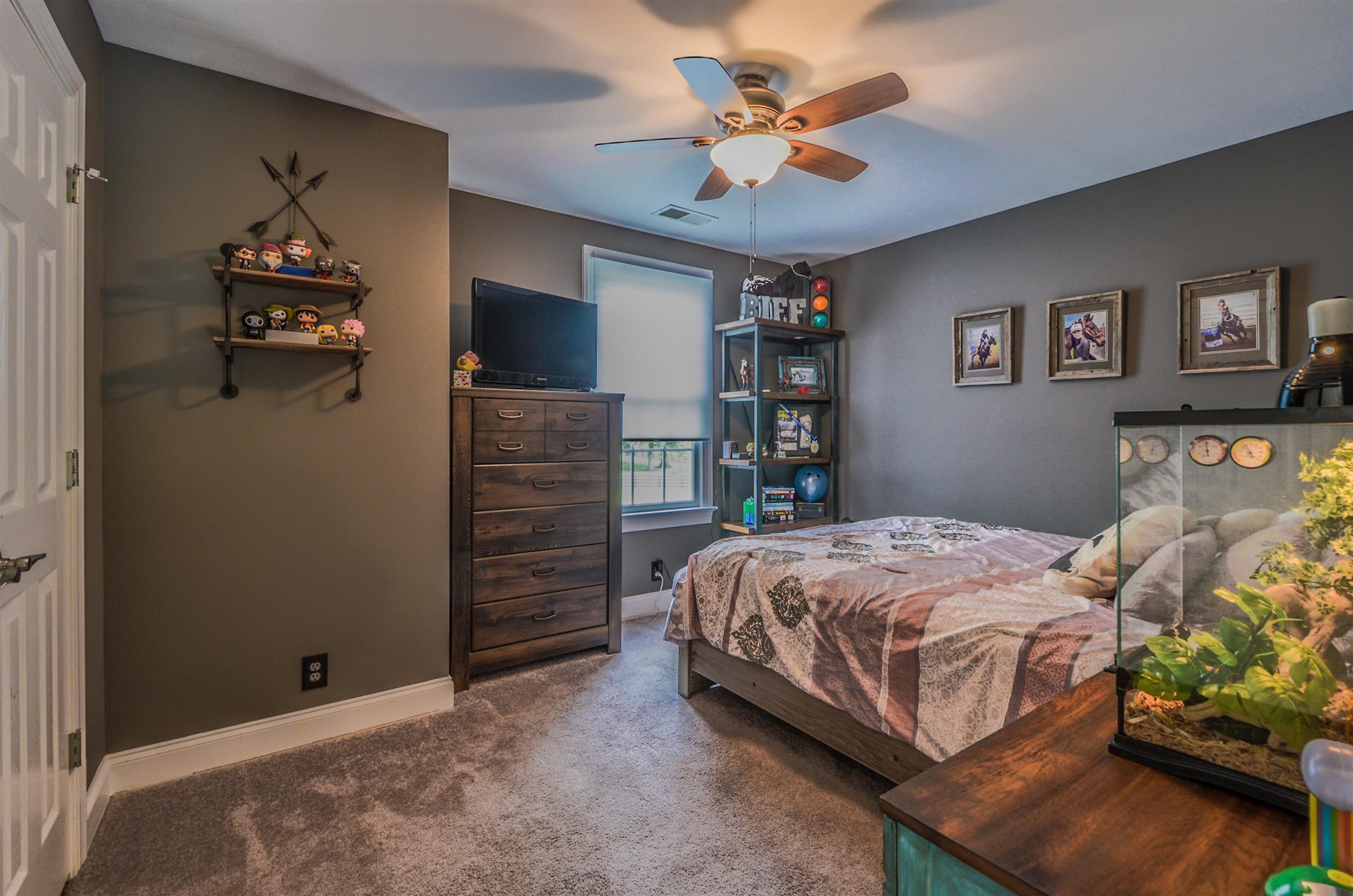 4097 Trinity Road Franklin, TN 37067 - Photo 24 of 30 a bedroom with a bed and a flat screen tv