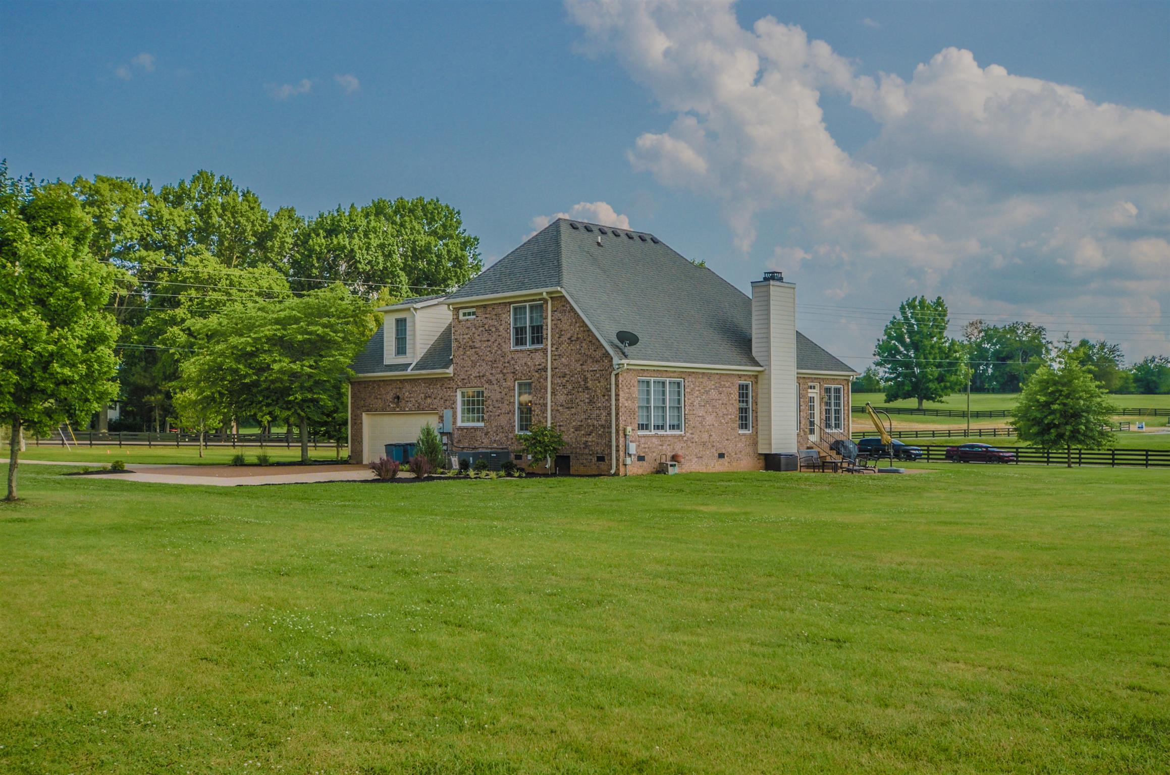 4097 Trinity Road Franklin, TN 37067 - Photo 30 of 30 a front view of a house with a garden
