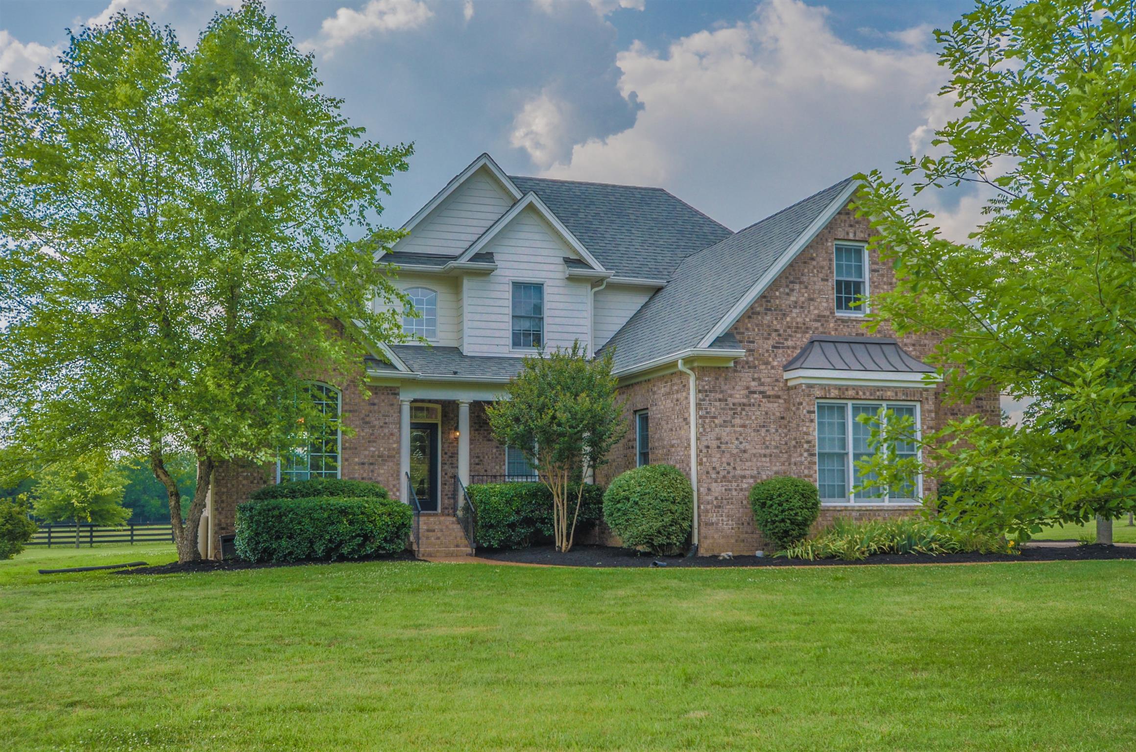 4097 Trinity Road Franklin, TN 37067 - Photo 5 of 30 a front view of a house with a yard