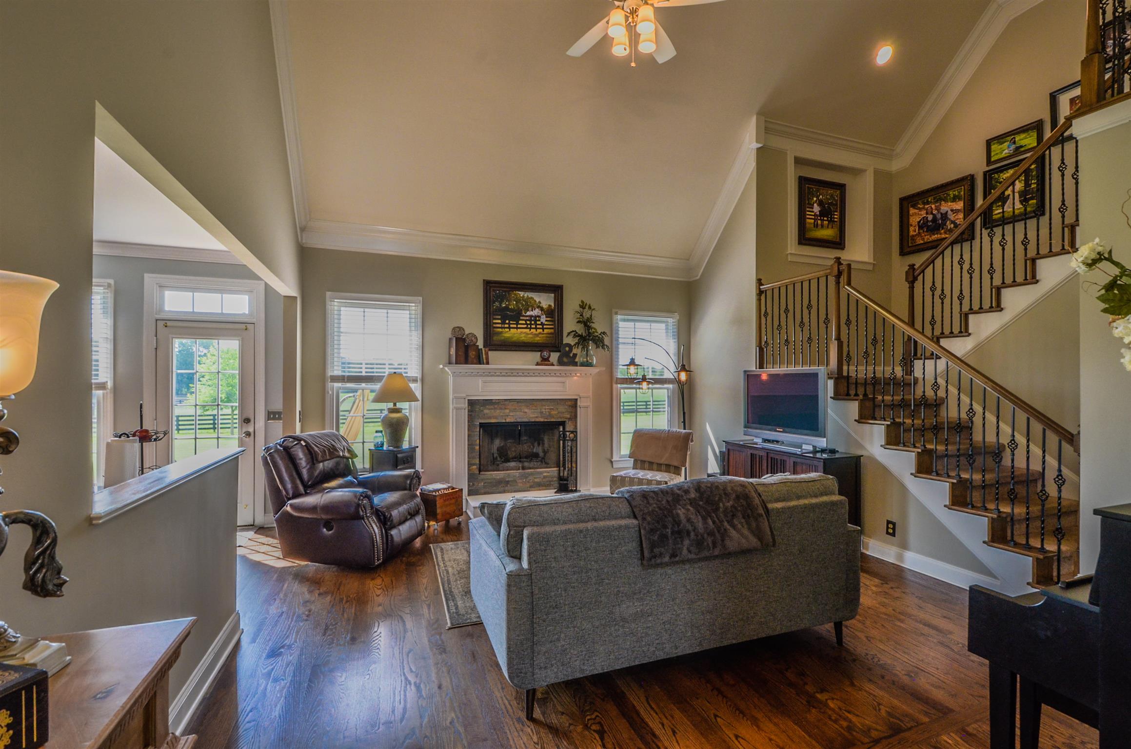 4097 Trinity Road Franklin, TN 37067 - Photo 9 of 30 a living room with furniture and a fireplace