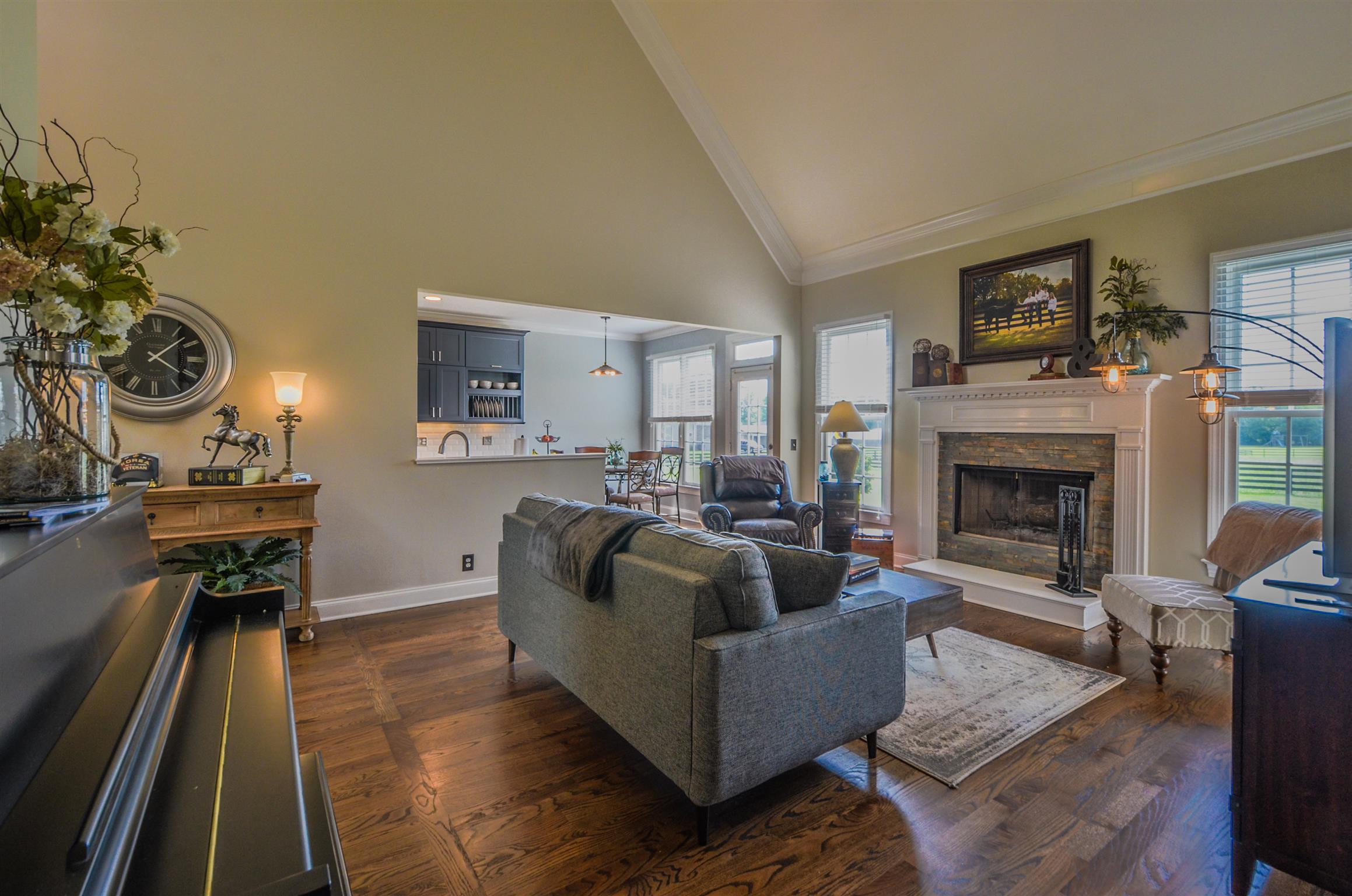 4097 Trinity Road Franklin, TN 37067 - Photo 10 of 30 a living room with furniture and a fireplace