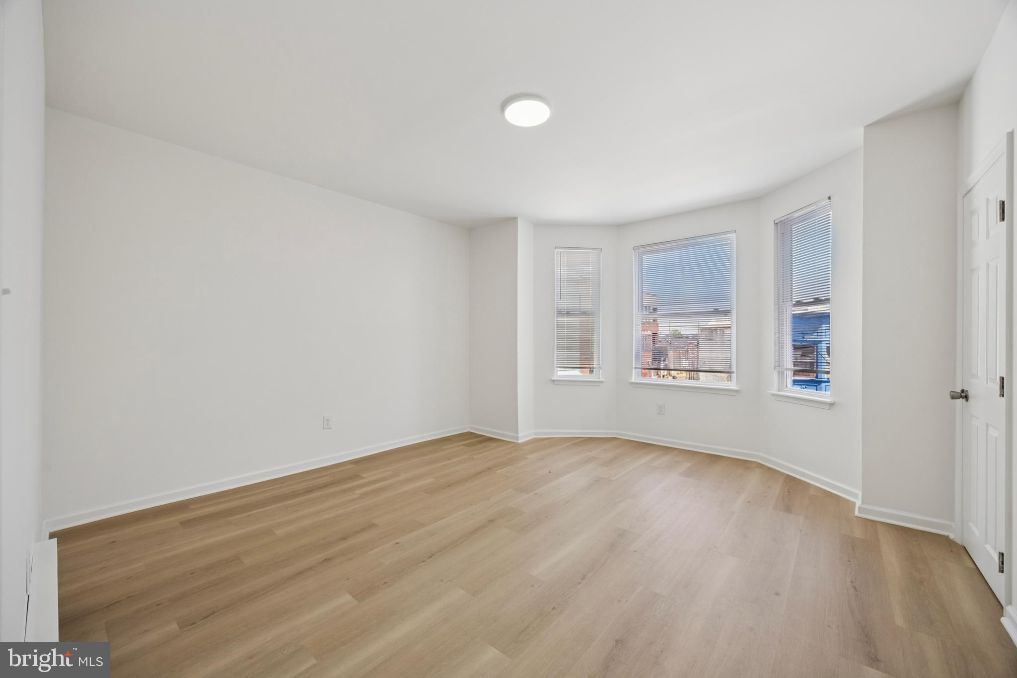 278 South 60th Street Philadelphia, PA 19139 - Photo 18 of 20 a view of empty room with wooden floor and fan
