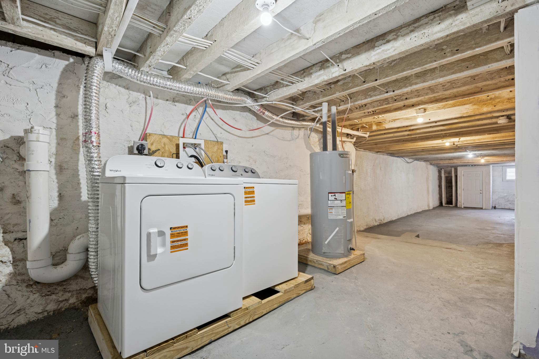 278 South 60th Street Philadelphia, PA 19139 - Photo 19 of 20 a utility room with dryer and washer