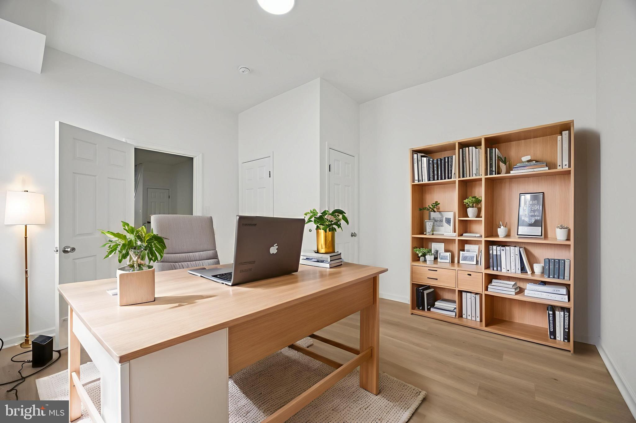 278 South 60th Street Philadelphia, PA 19139 - Photo 8 of 20 a room with furniture and a book shelf