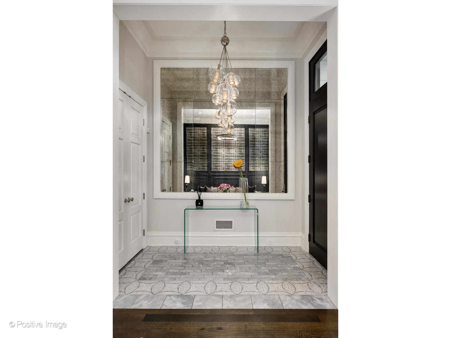 1720 North Mohawk Street Chicago, IL 60614 - Photo 2 of 48 a living room with furniture and a chandelier