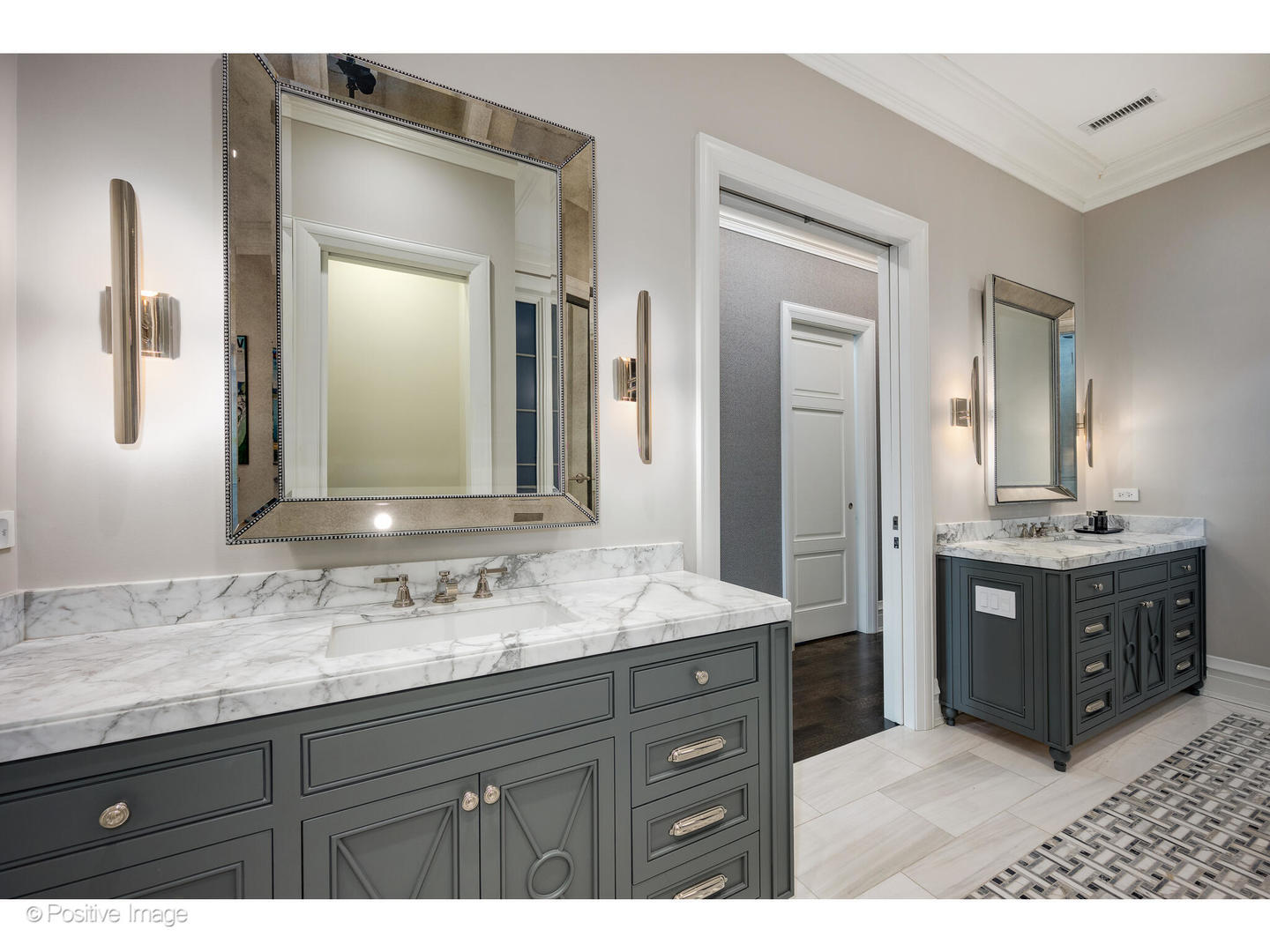 1720 North Mohawk Street Chicago, IL 60614 - Photo 23 of 48 a bathroom with a granite countertop double vanity sink and a mirror