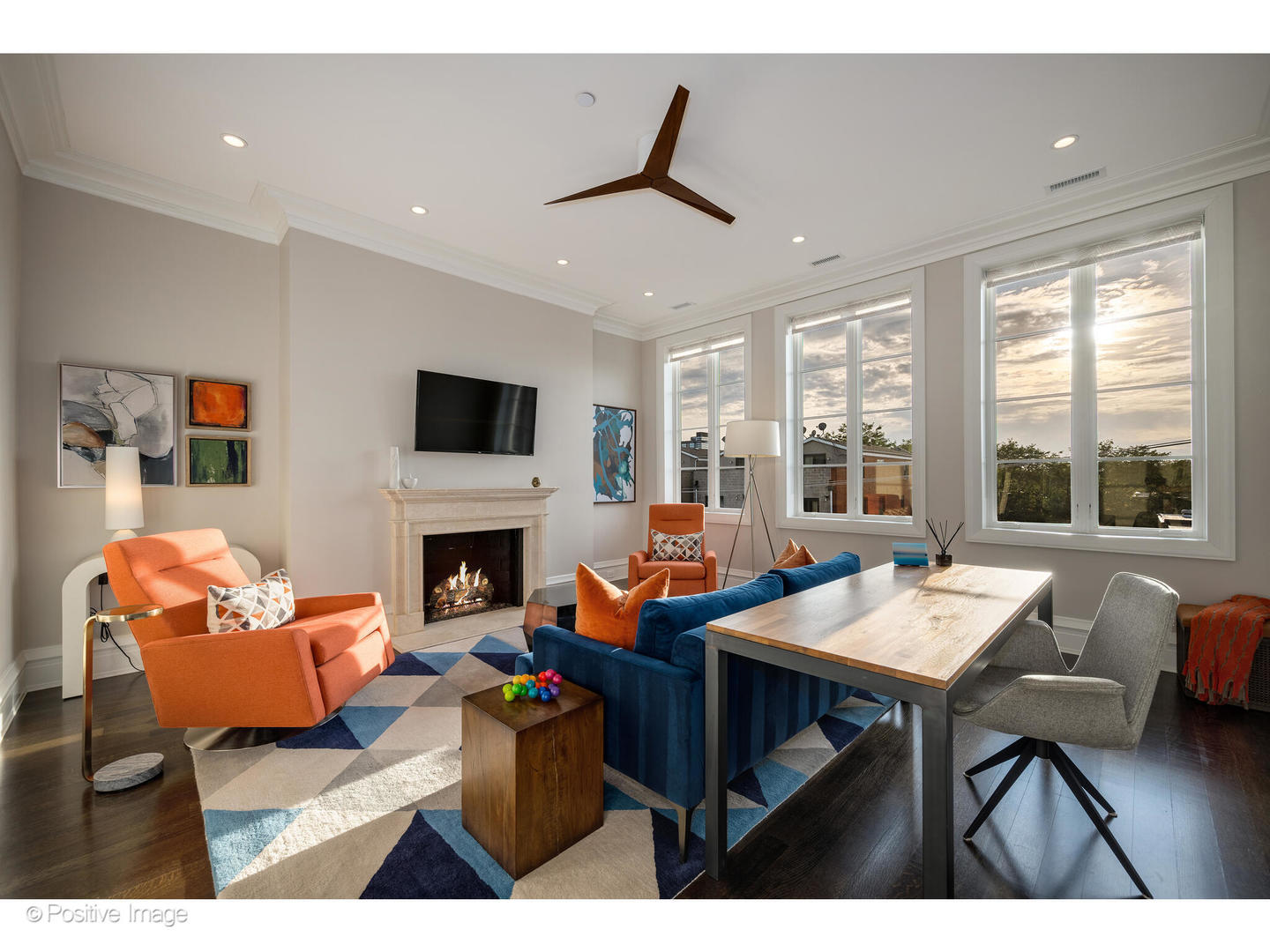 1720 North Mohawk Street Chicago, IL 60614 - Photo 34 of 48 a living room with furniture a fireplace and a flat screen tv