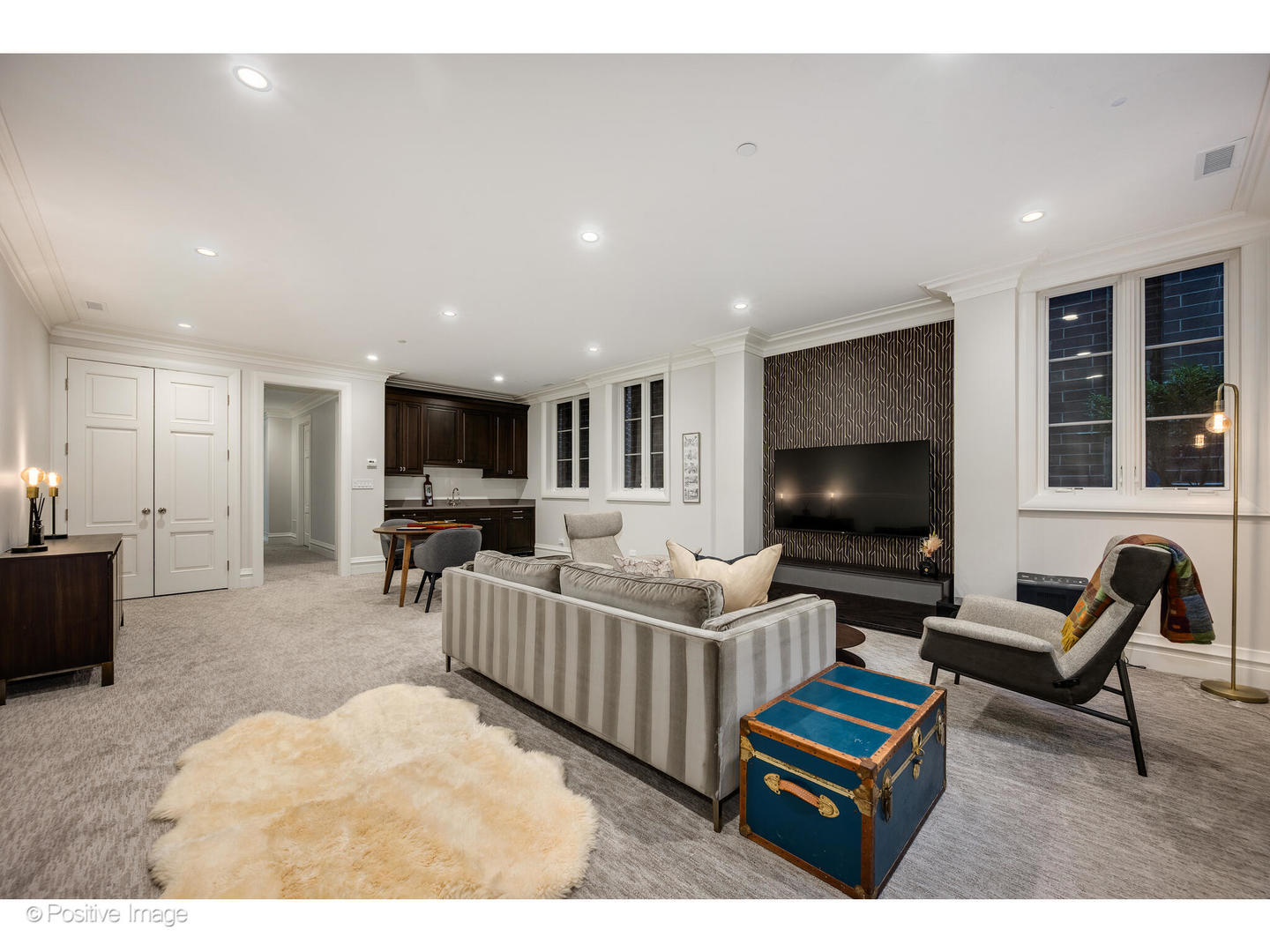 1720 North Mohawk Street Chicago, IL 60614 - Photo 39 of 48 a living room with furniture and a flat screen tv