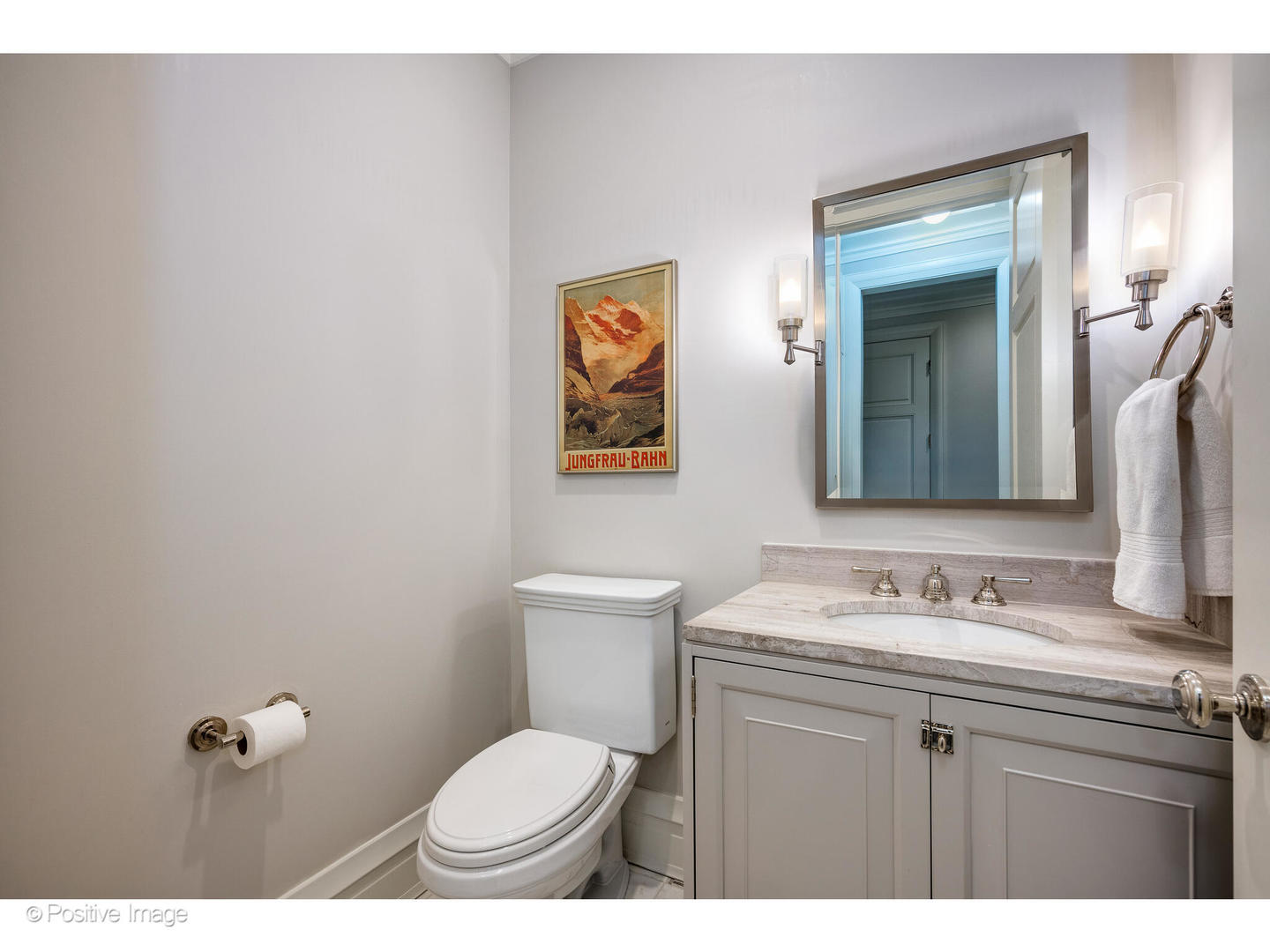 1720 North Mohawk Street Chicago, IL 60614 - Photo 44 of 48 a bathroom with a toilet a sink and mirror