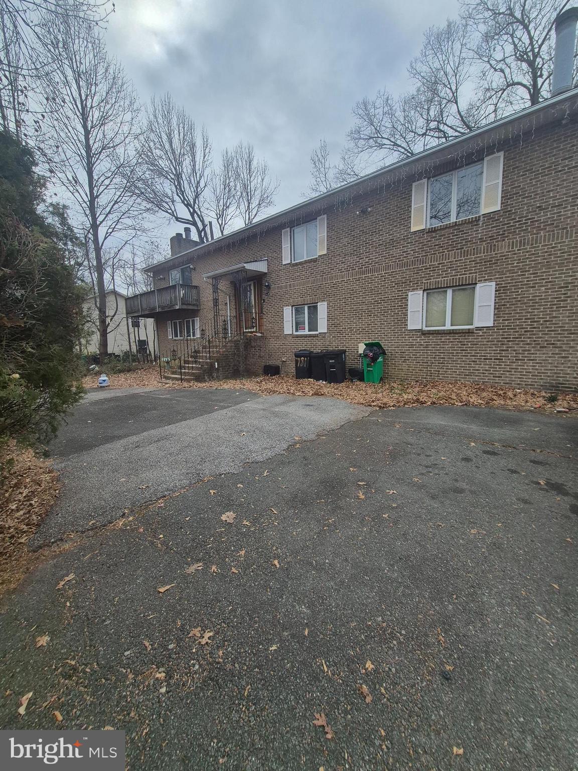 7811 Heflin Drive Clinton, MD 20735 - Photo 1 of 16 a view of a house with a yard