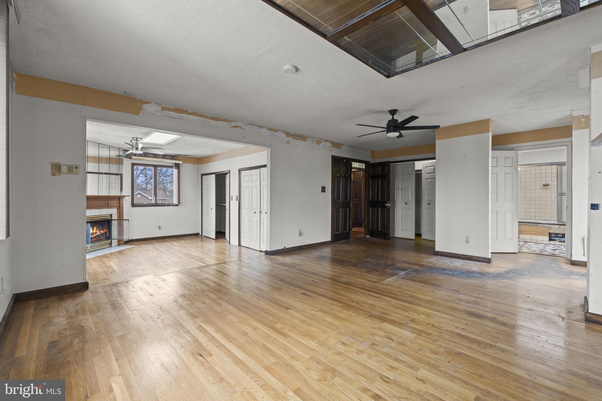 7811 Heflin Drive Clinton, MD 20735 - Photo 21 of 55 a view of livingroom with an empty space and wooden floor
