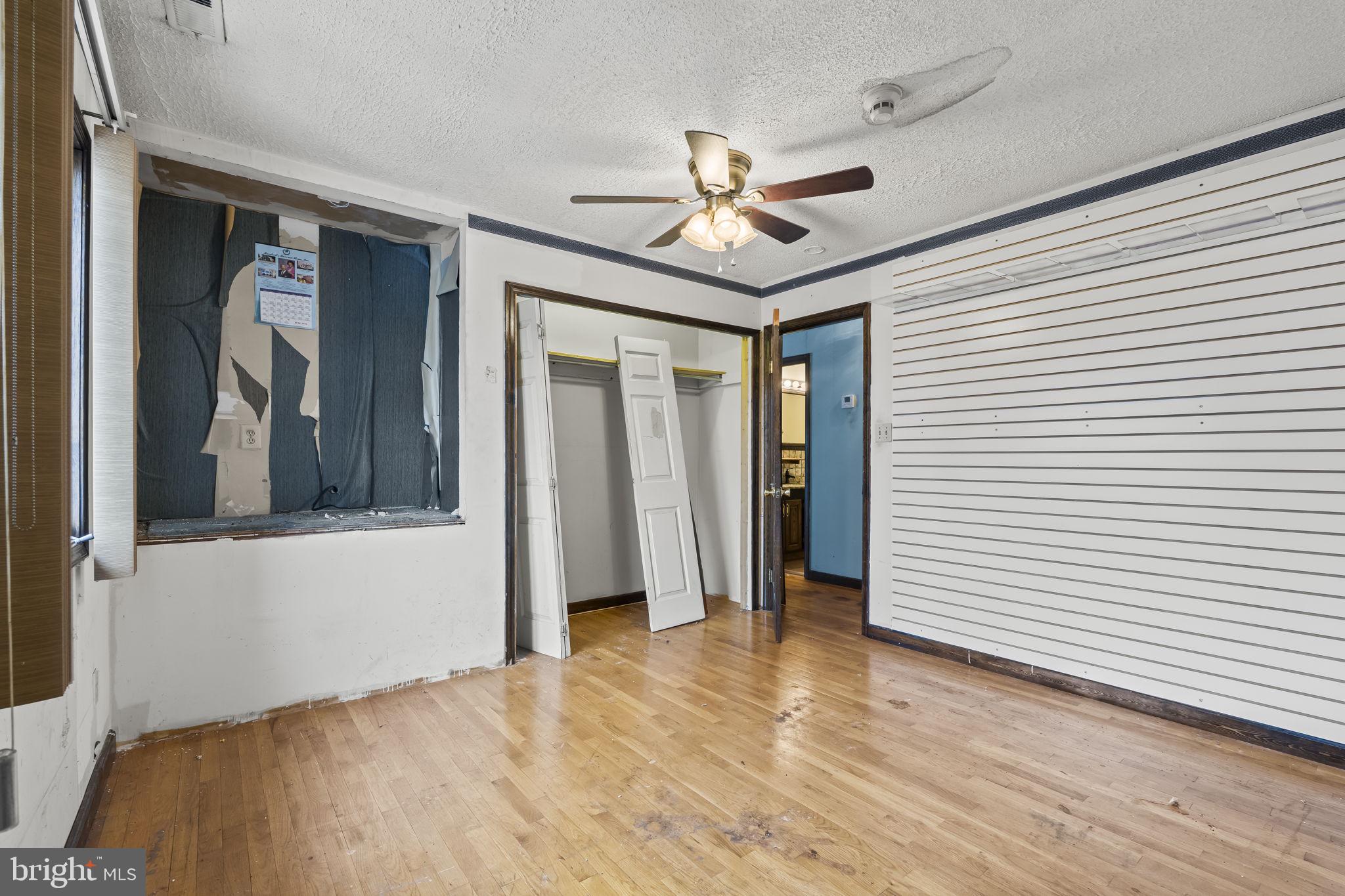 7811 Heflin Drive Clinton, MD 20735 - Photo 35 of 55 a view of a livingroom with a ceiling fan and window