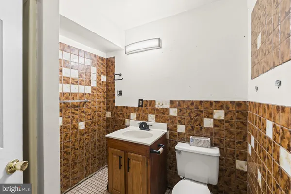 a bathroom with a shower and a sink