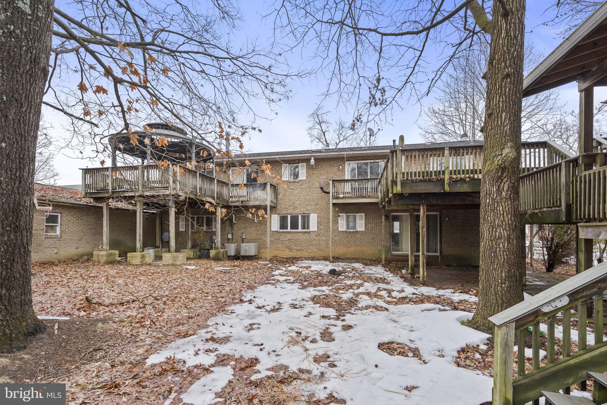 7811 Heflin Drive Clinton, MD 20735 - Photo 51 of 55 a front view of a building with a yard