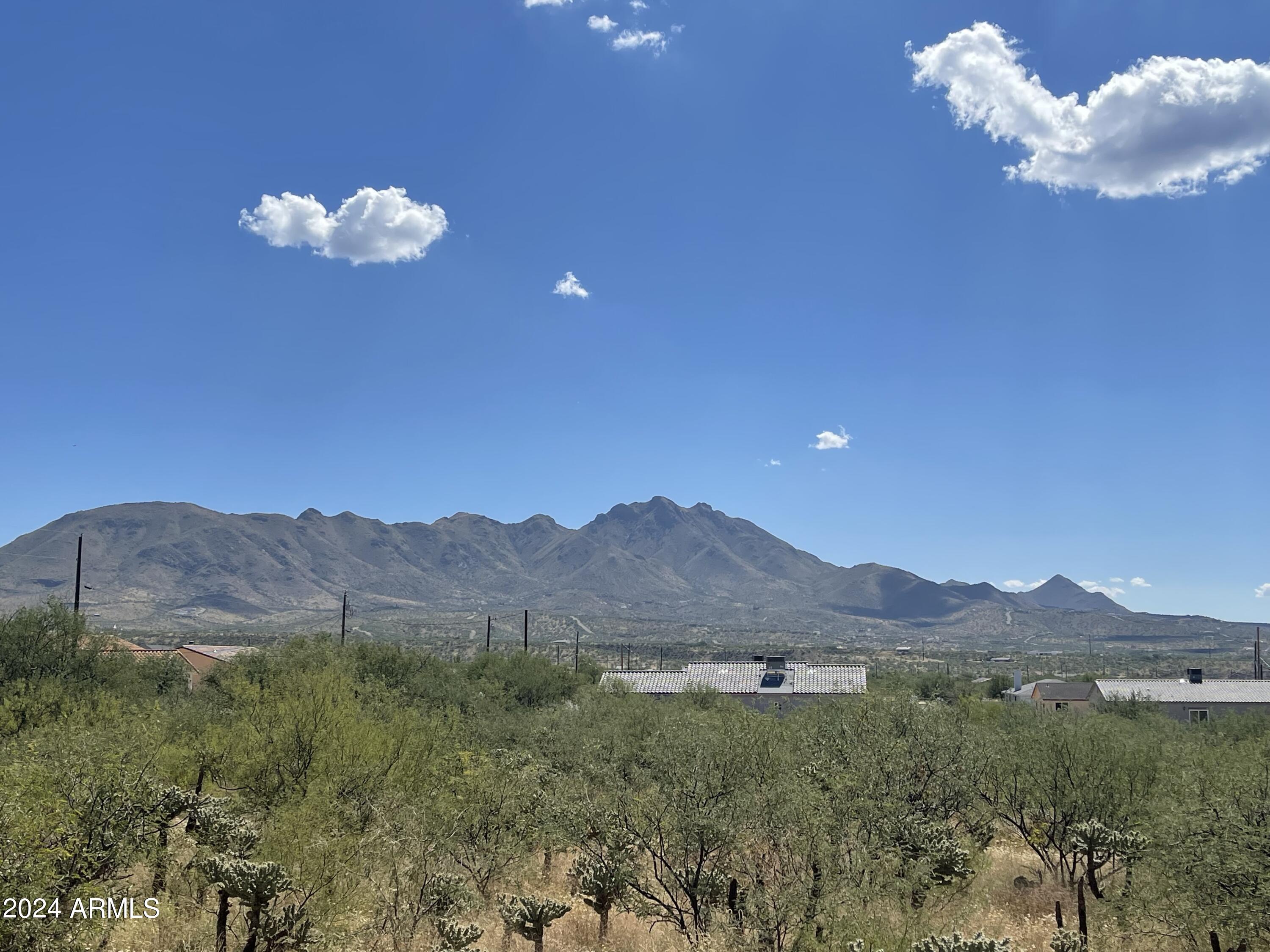 1798 Birmania Corte Rio Rico, AZ 85648 - Photo 5 of 27 a view of a city with mountain