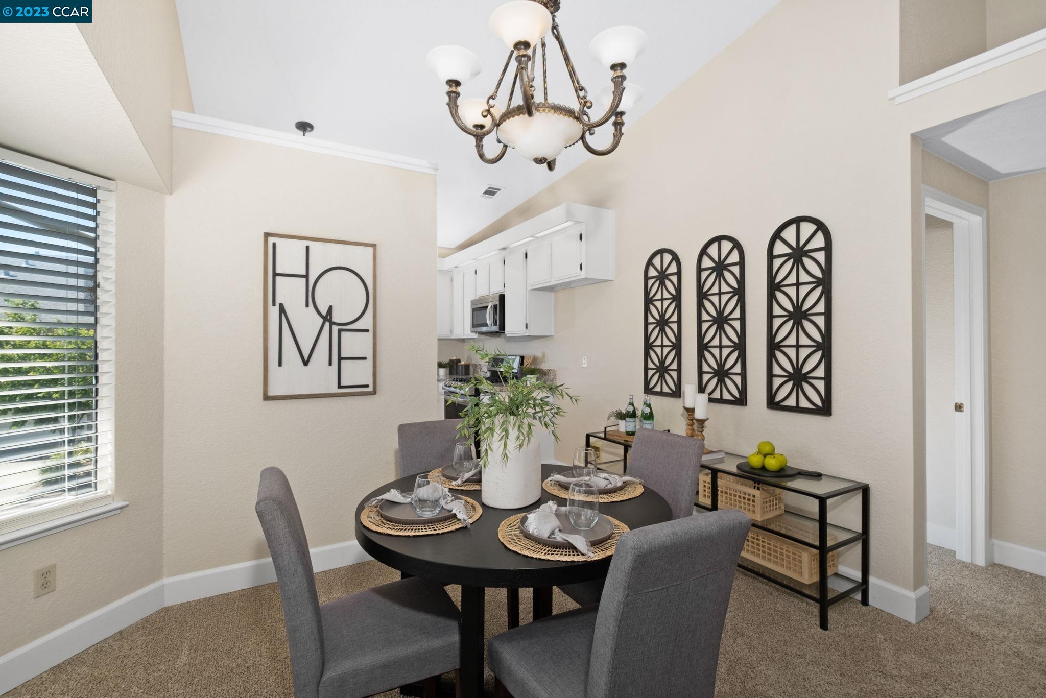 570 Bustos Place Bay Point, CA 94565 - Photo 11 of 26 a view of a dining room with furniture and wooden floor