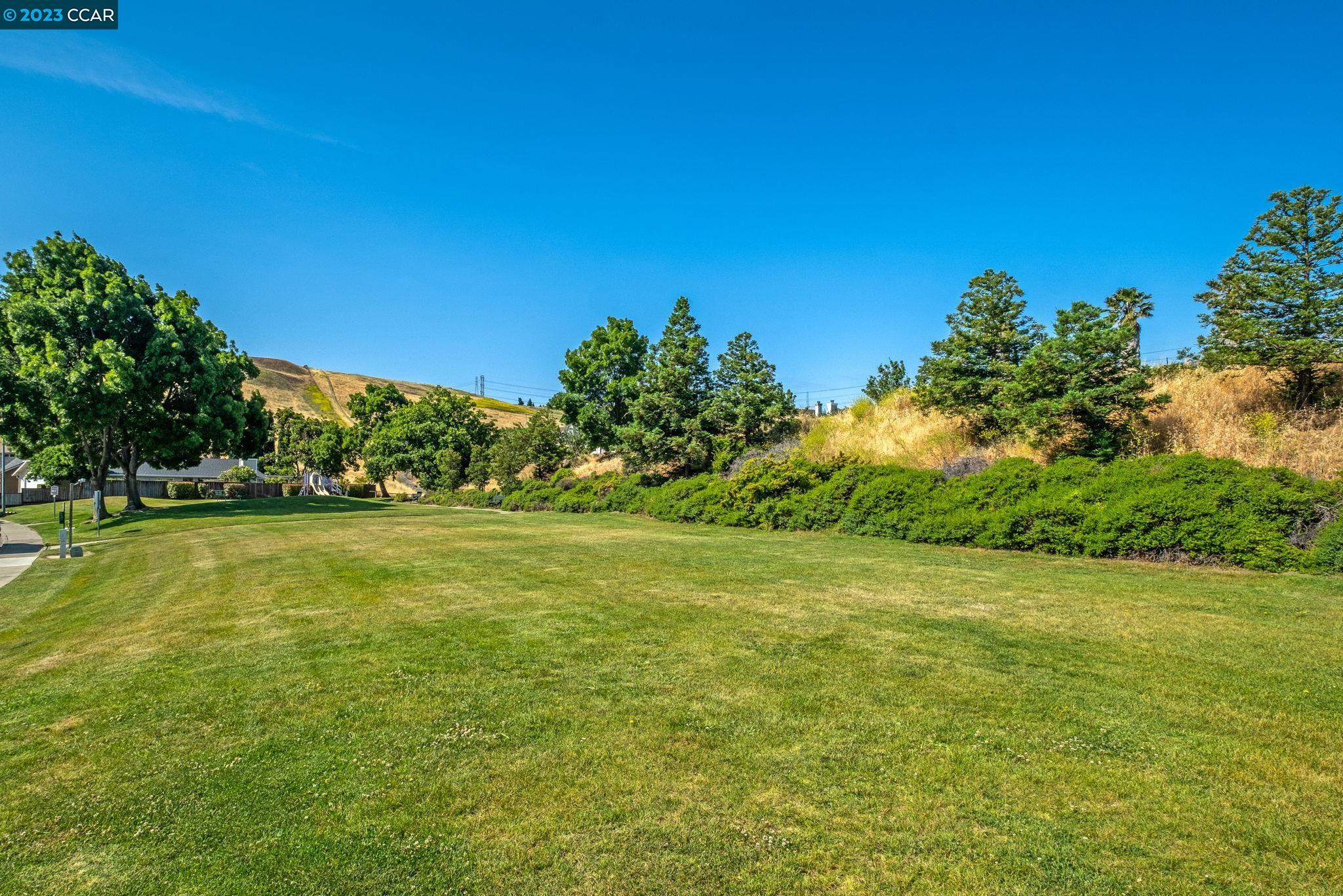 570 Bustos Place Bay Point, CA 94565 - Photo 24 of 26 a view of field with trees in the background