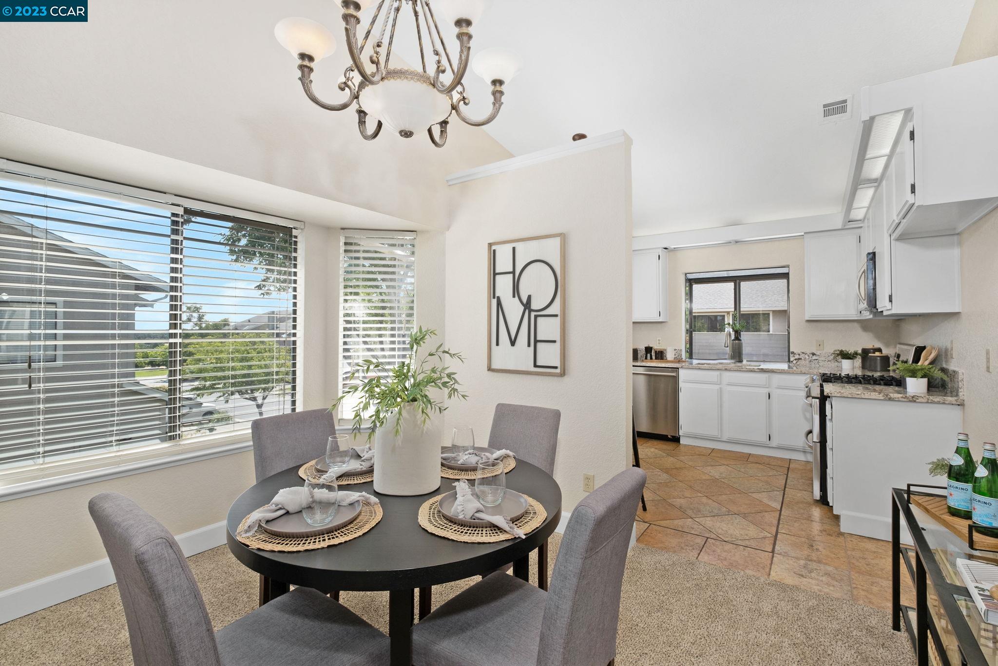 570 Bustos Place Bay Point, CA 94565 - Photo 5 of 26 a view of a dining room with furniture window and outside view