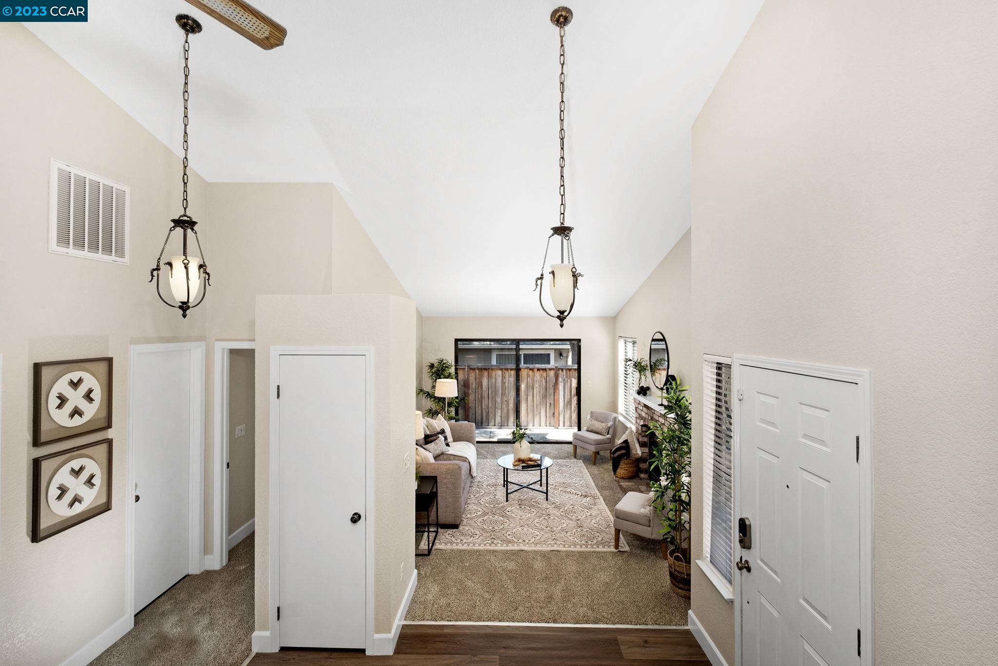570 Bustos Place Bay Point, CA 94565 - Photo 9 of 26 a view of a room with lots of furniture and windows