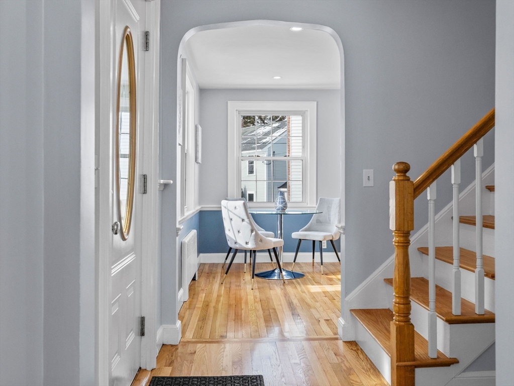 7 Neillian Crescent Boston, MA 02130 - Photo 10 of 29 a view of a dining room with furniture and wooden floor